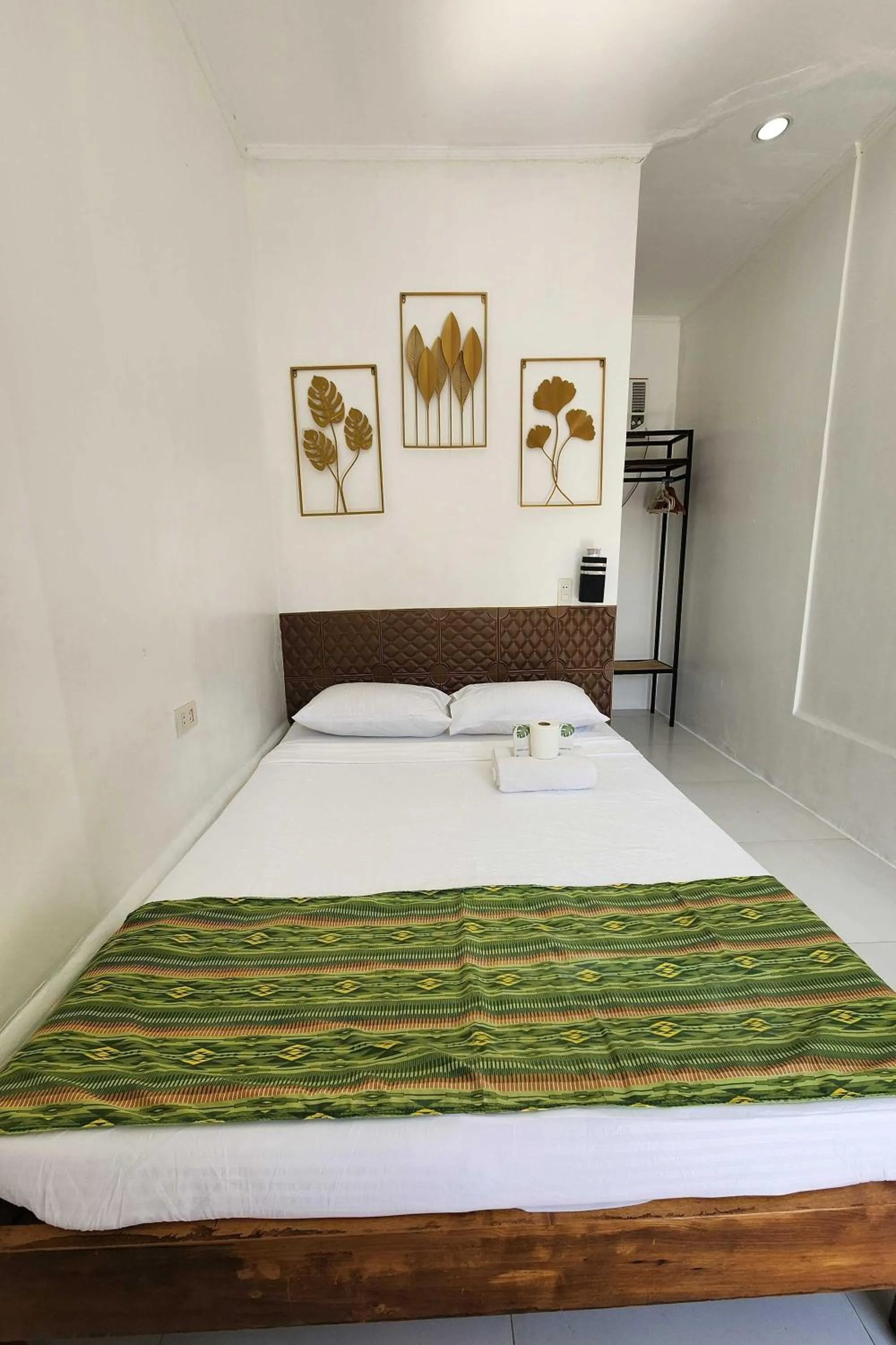 Bed in Green Dale's Travellers Inn Puerto Princesa