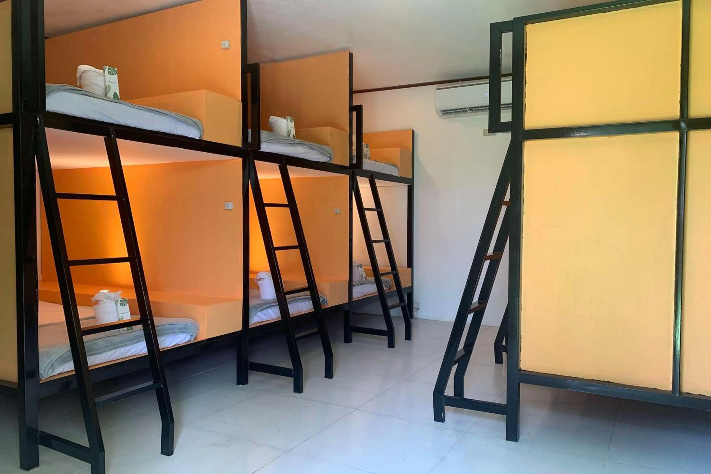 Photo of the whole room, Bed in Green Dale's Travellers Inn Puerto Princesa