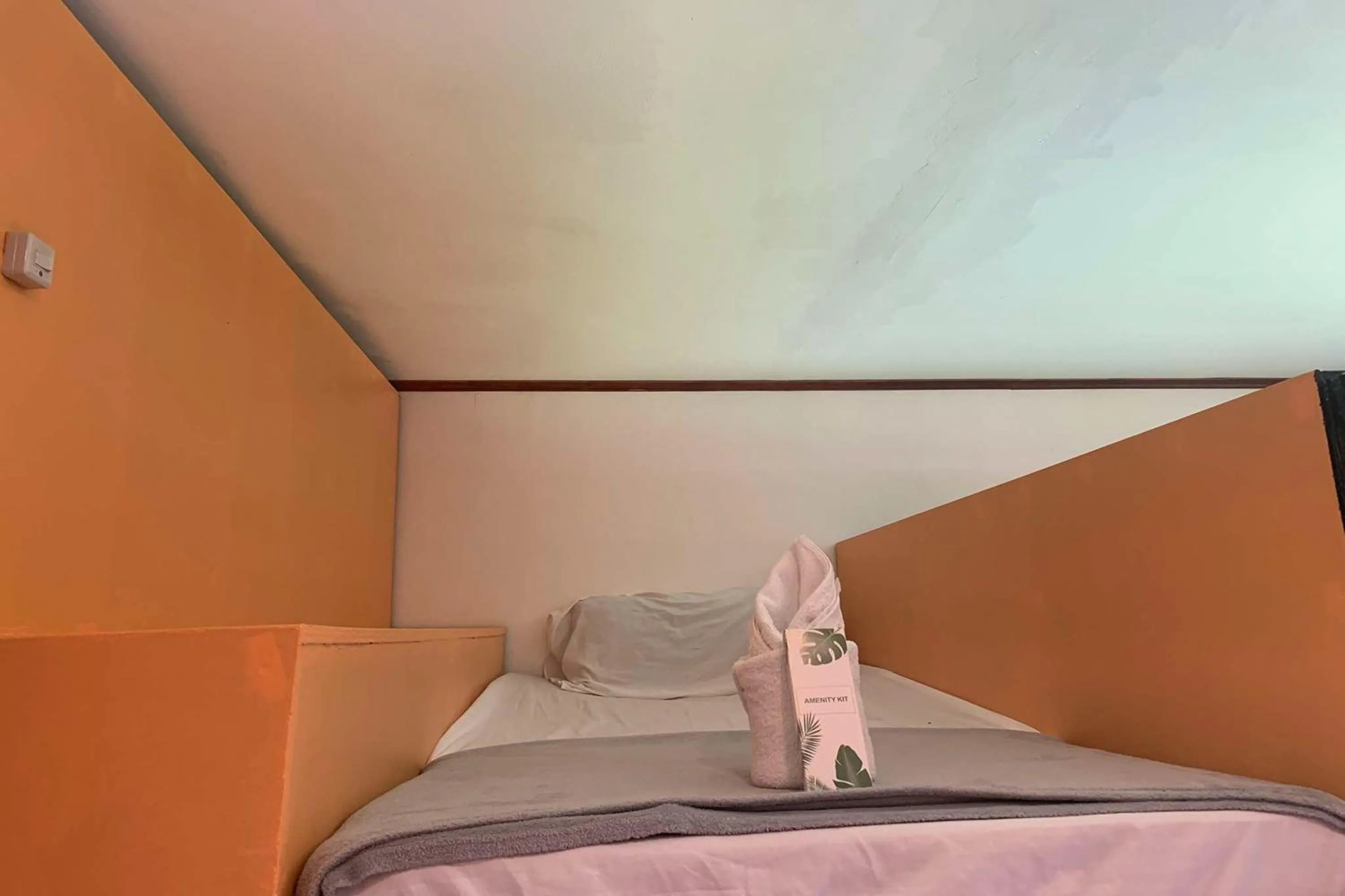 Bed in Green Dale's Travellers Inn Puerto Princesa