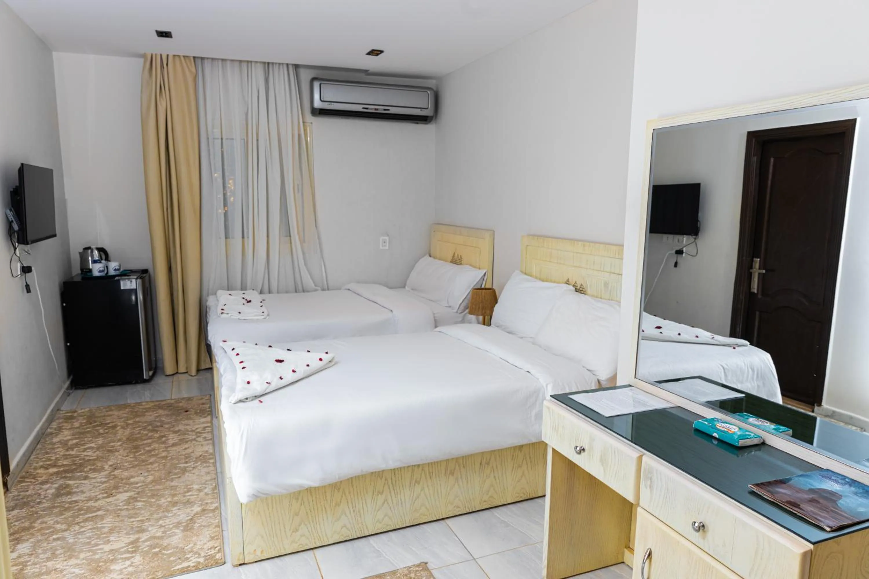 Bed in Pyramids Land Hotel