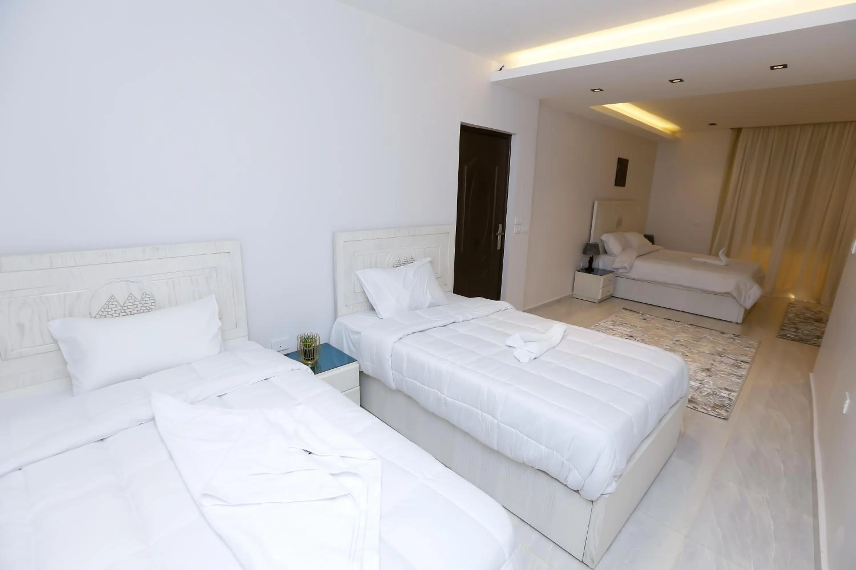 Bed in Pyramids Land Hotel