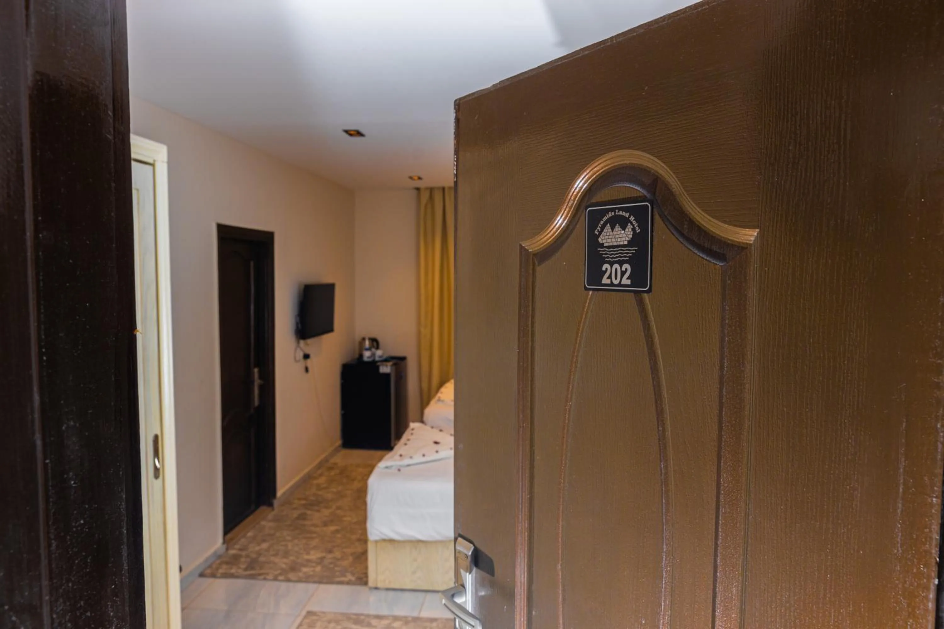 Bedroom, Bed in Pyramids Land Hotel