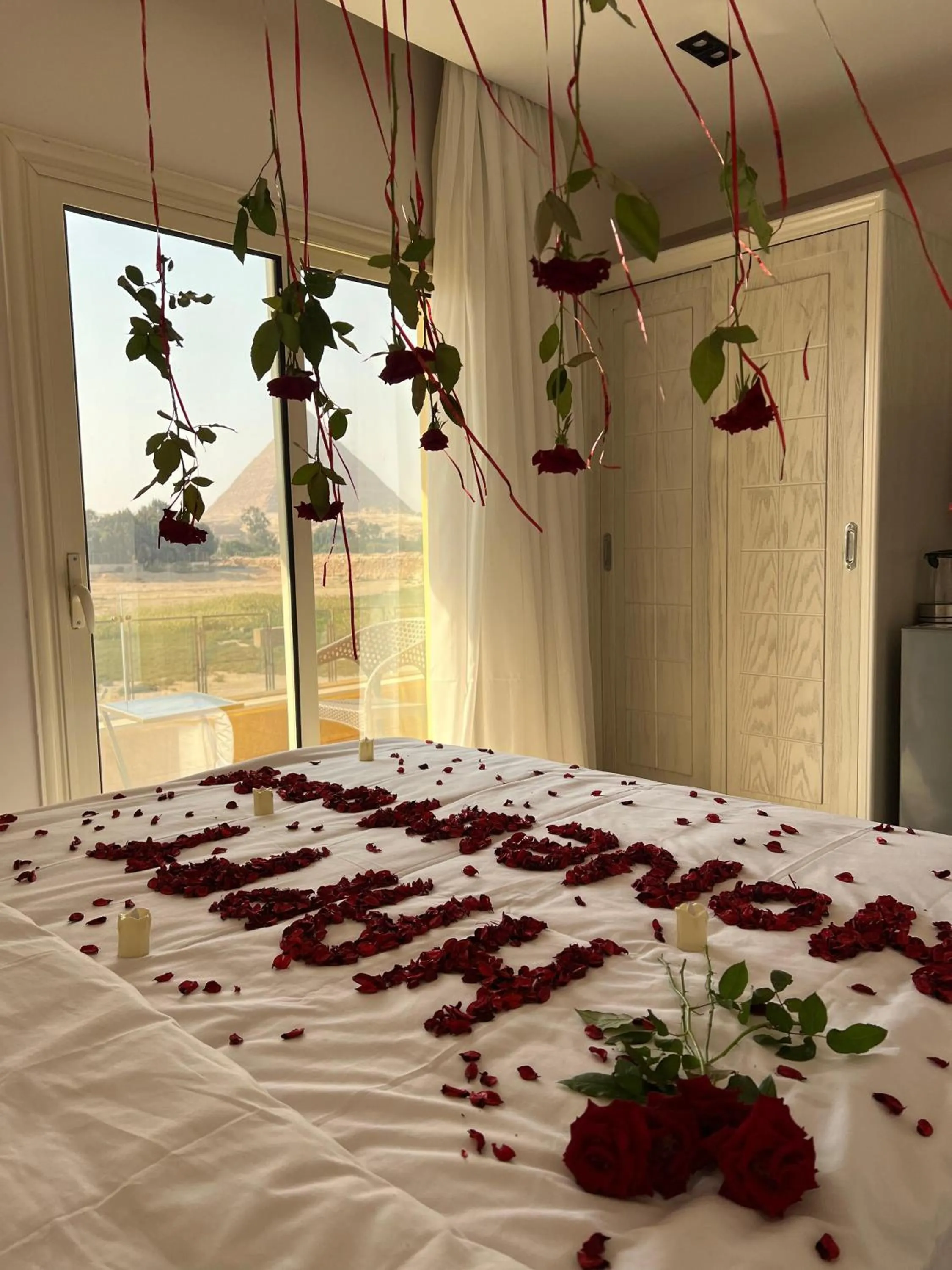 Bed in Pyramids Land Hotel