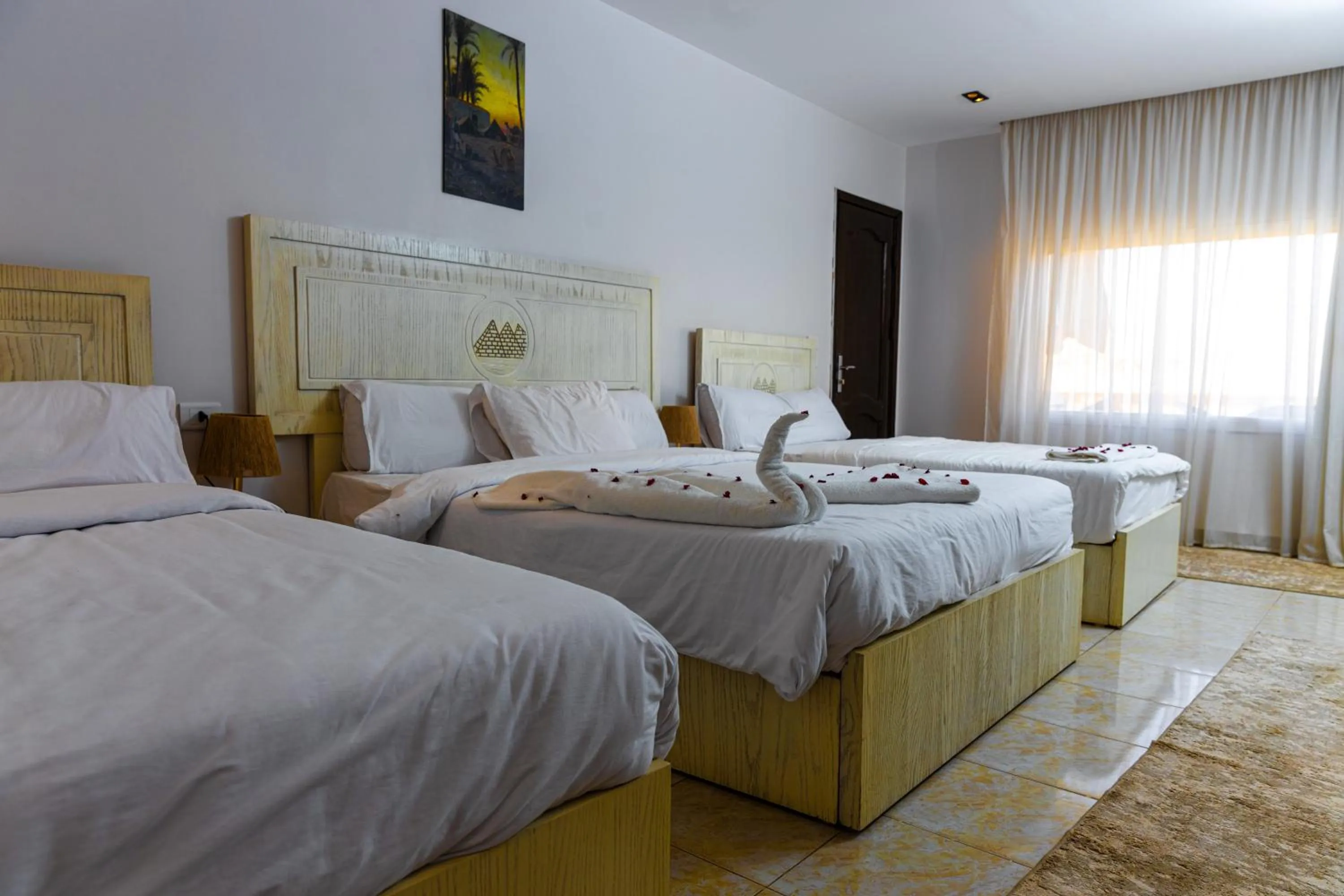 Bed in Pyramids Land Hotel