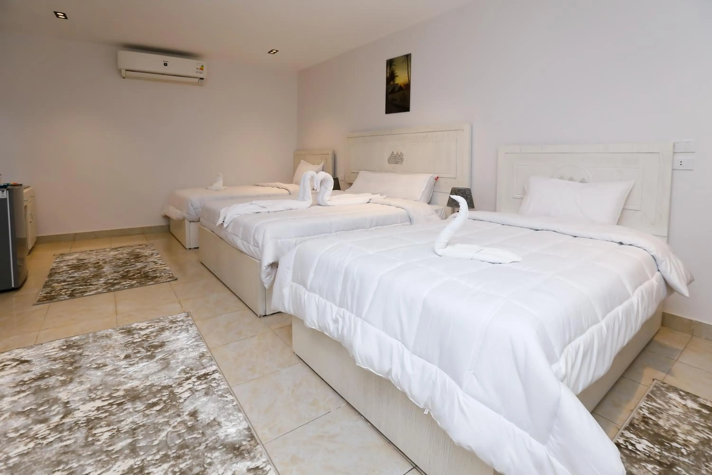 Bed in Pyramids Land Hotel