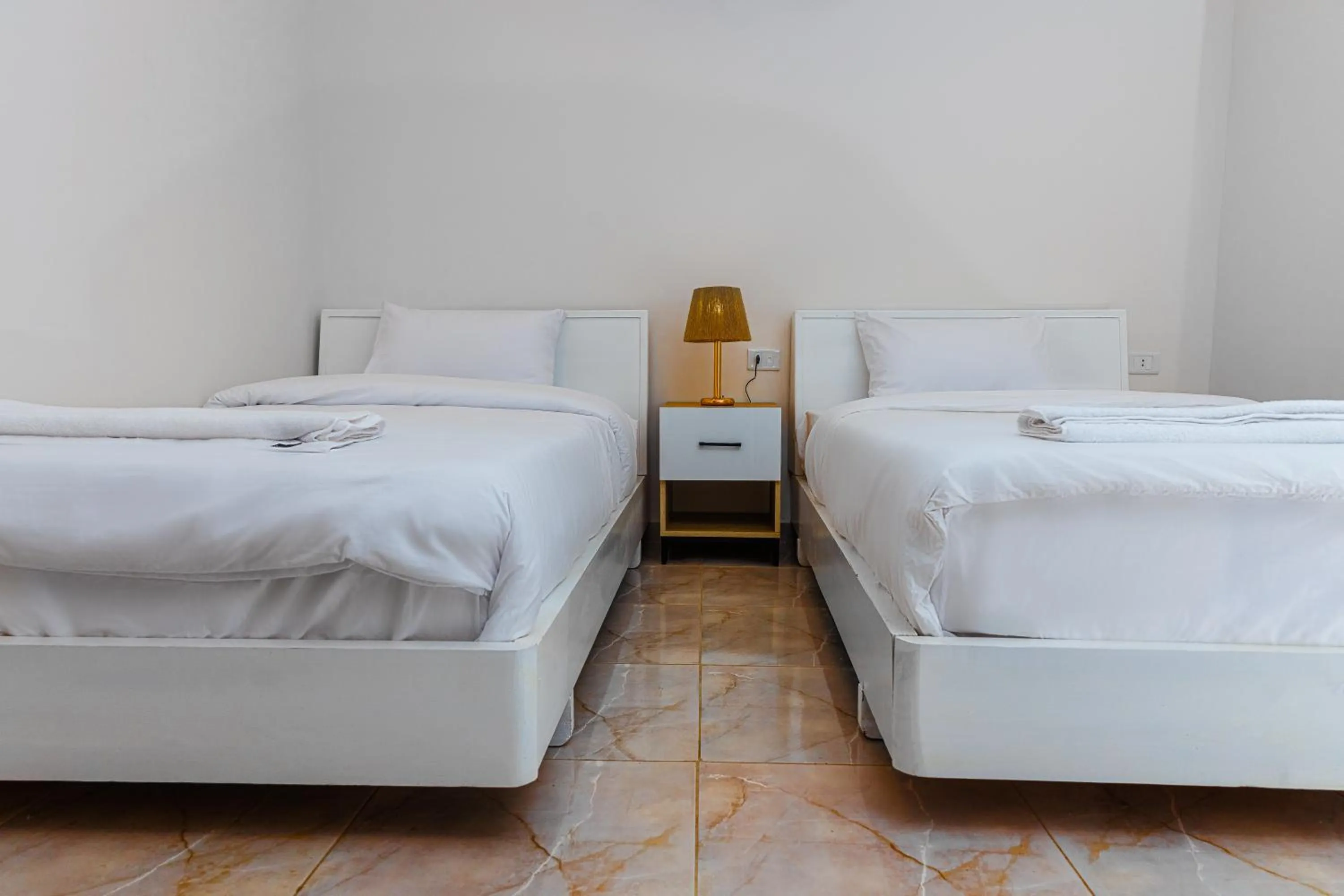 Bed in Pyramids Land Hotel