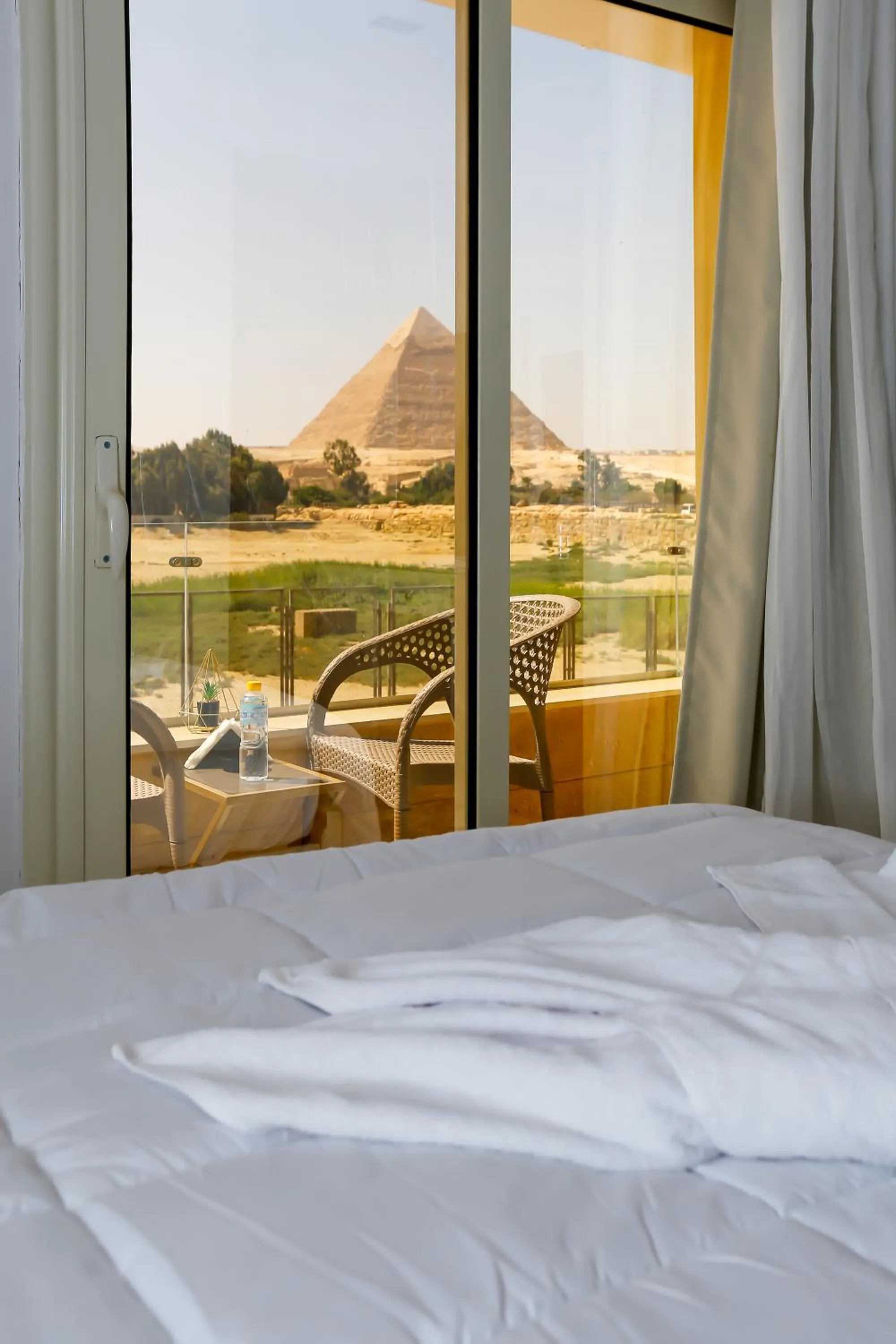 Bed in Pyramids Land Hotel