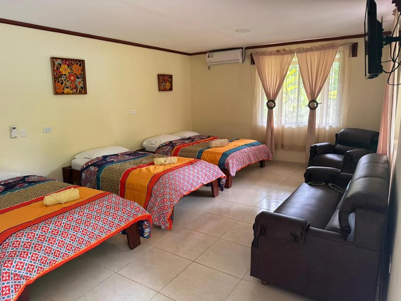 Bed in RIVER SIDE LODGE