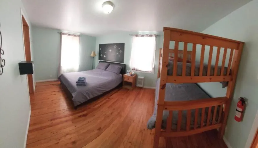 Bed in Auberge Le P'tit Bonheur