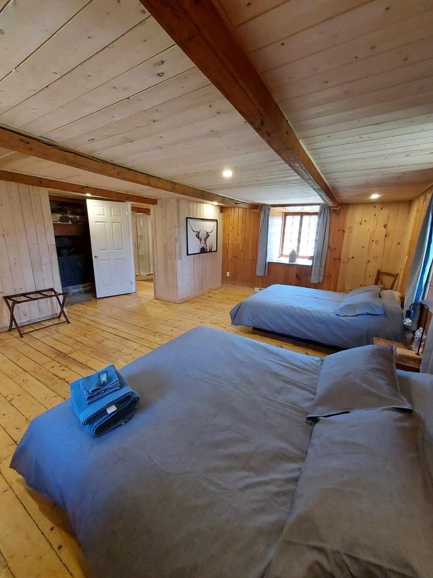 Bed in Auberge Le P'tit Bonheur