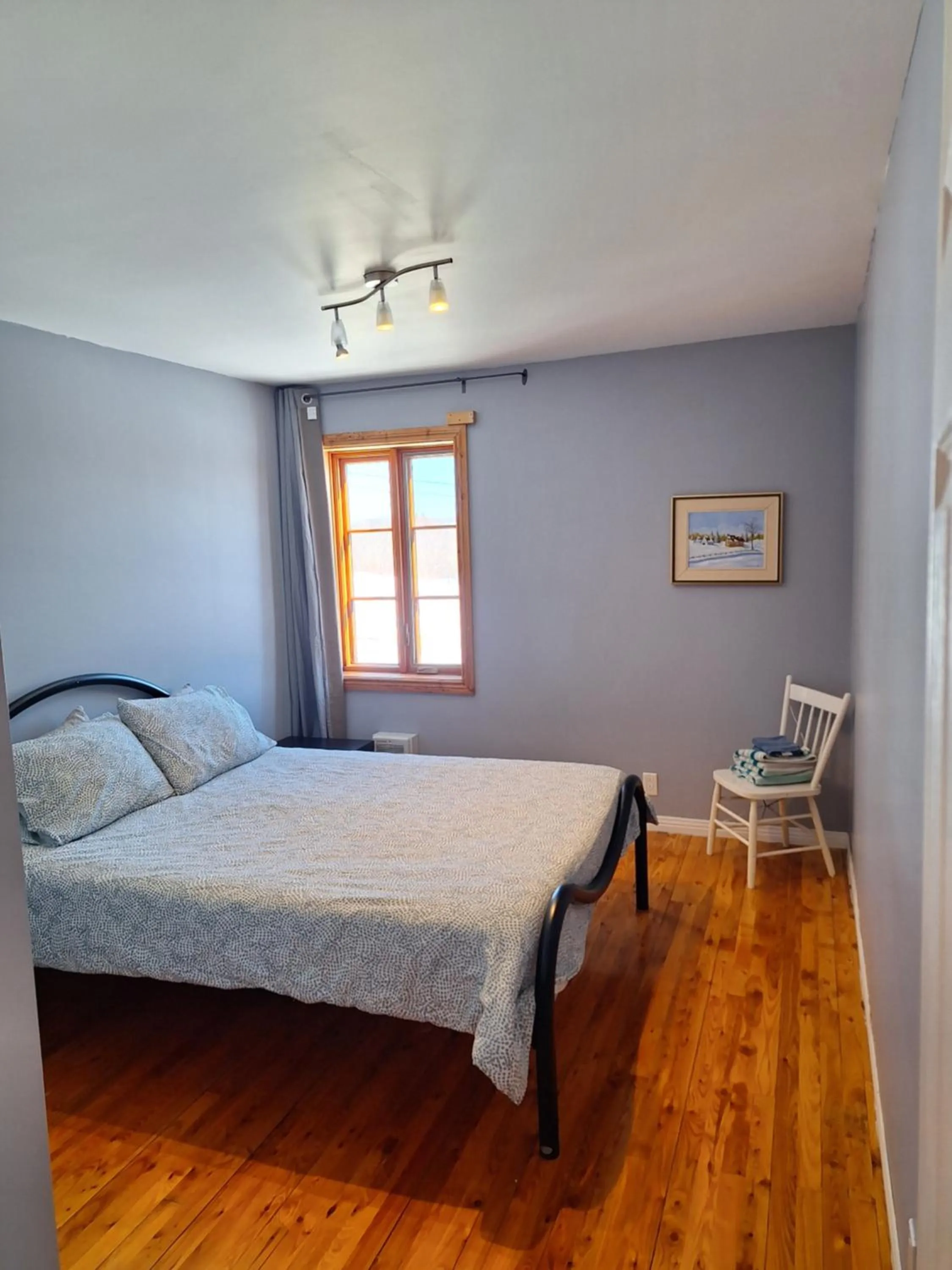 Bed in Auberge Le P'tit Bonheur