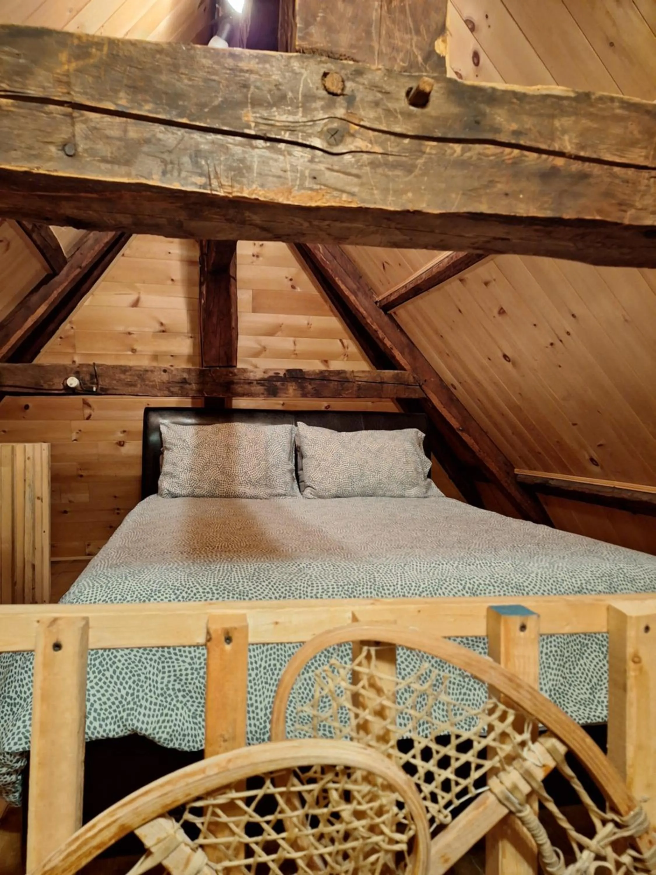 Bed in Auberge Le P'tit Bonheur