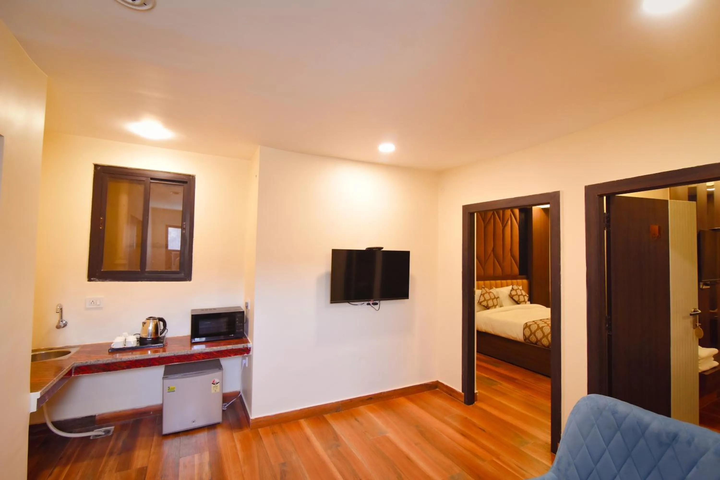 Living room, Bed in Hotel Swagat Suites