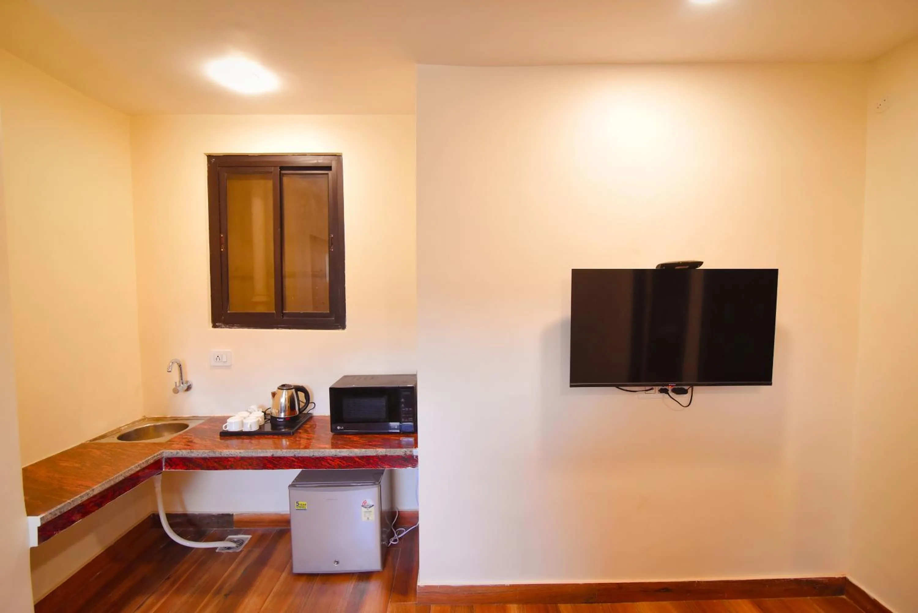 Kitchen or kitchenette in Hotel Swagat Suites