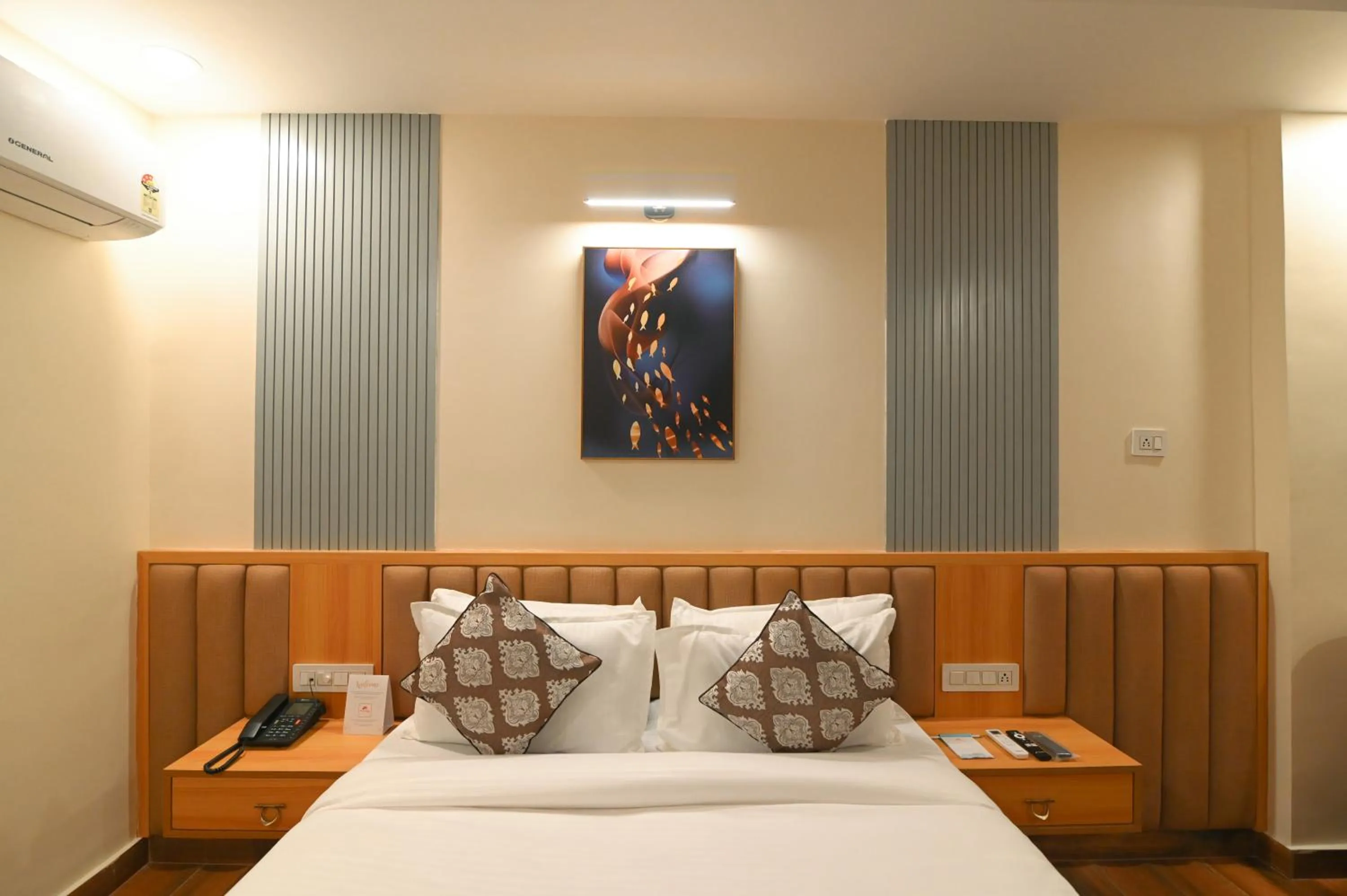 Bed in Hotel Swagat Suites