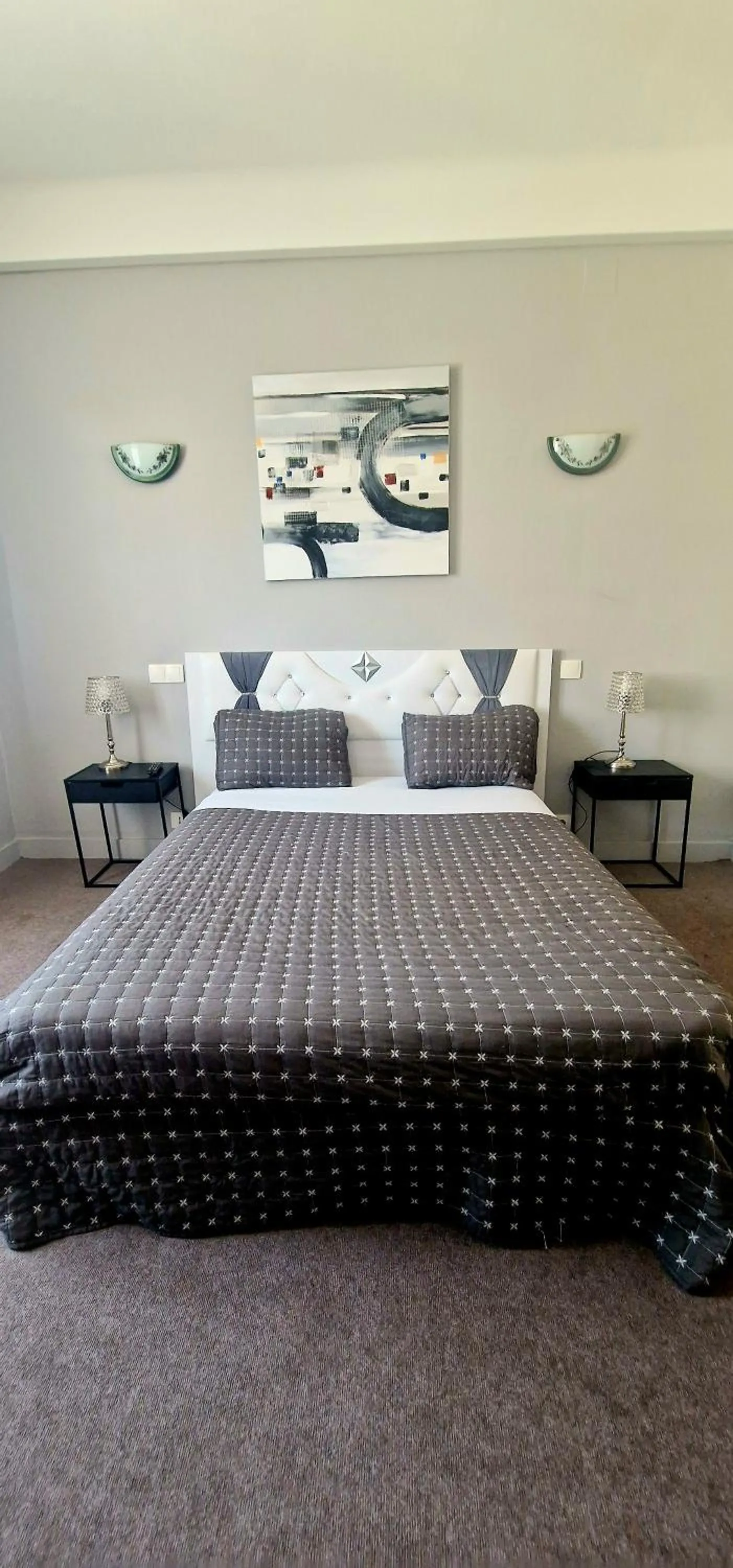 Bed in Hôtel de la cloche