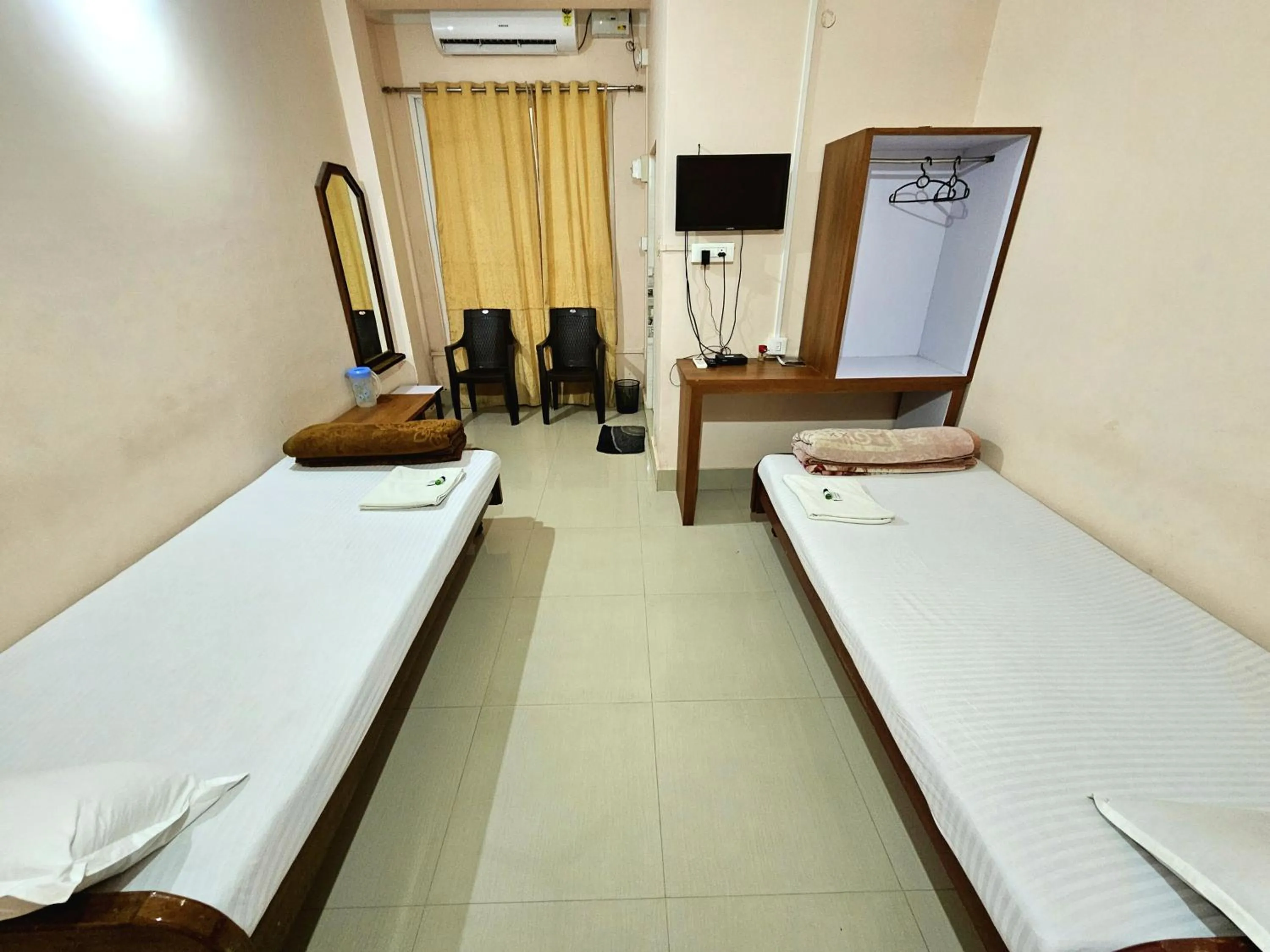 Bed in Hotel Rishiraj