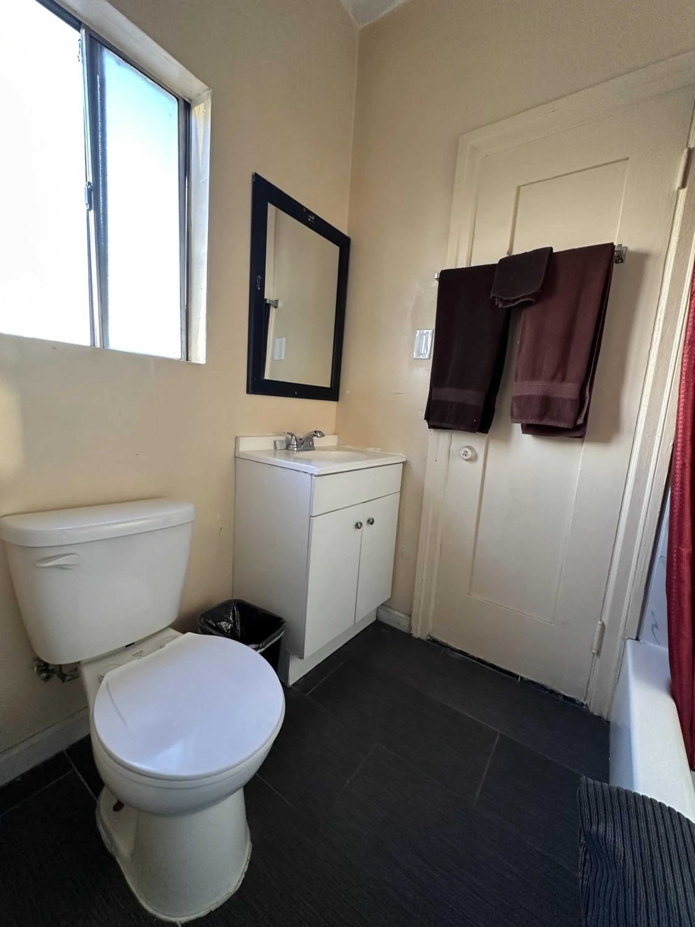 Toilet in Unity Hotel - No Parking & Rooms Are Upstairs