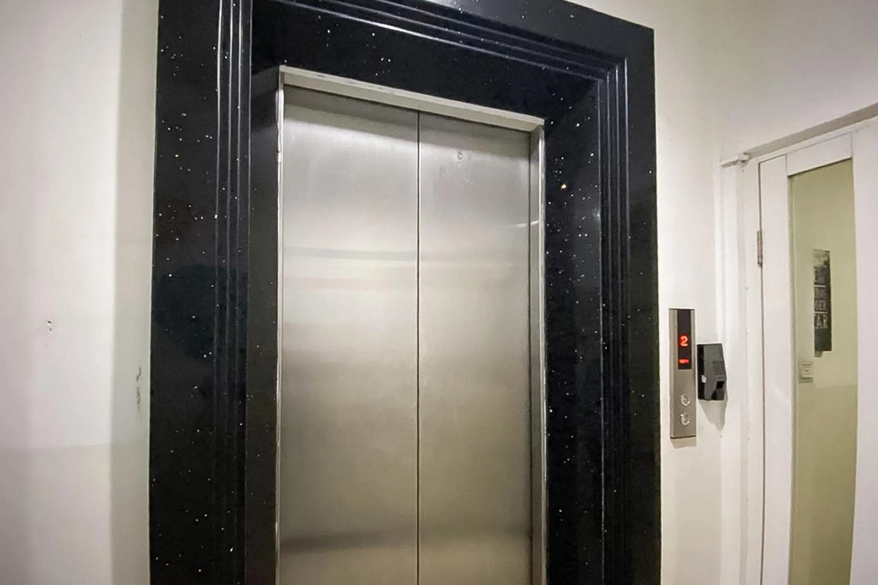 elevator in RedDoorz Hostel at FInest Medan