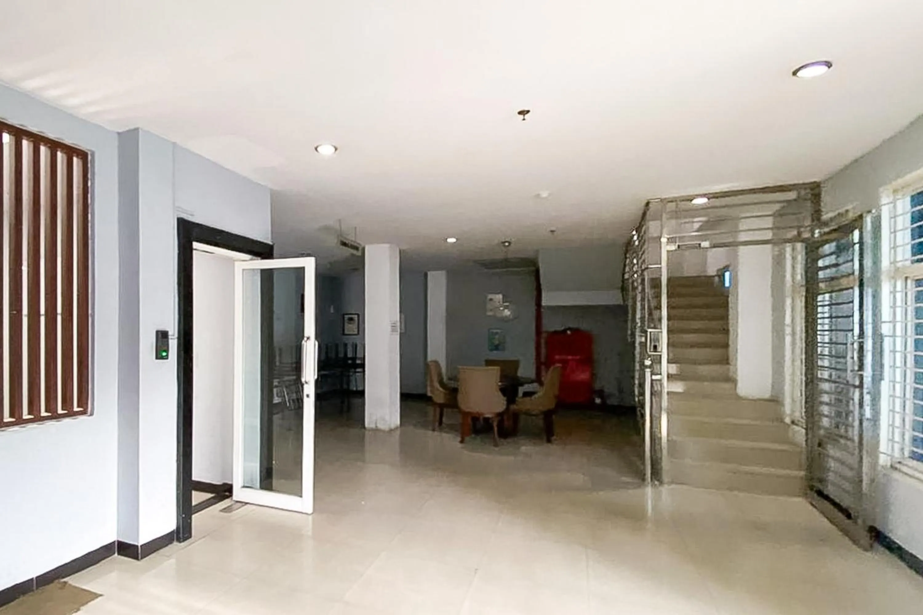 Seating area in RedDoorz Hostel at FInest Medan