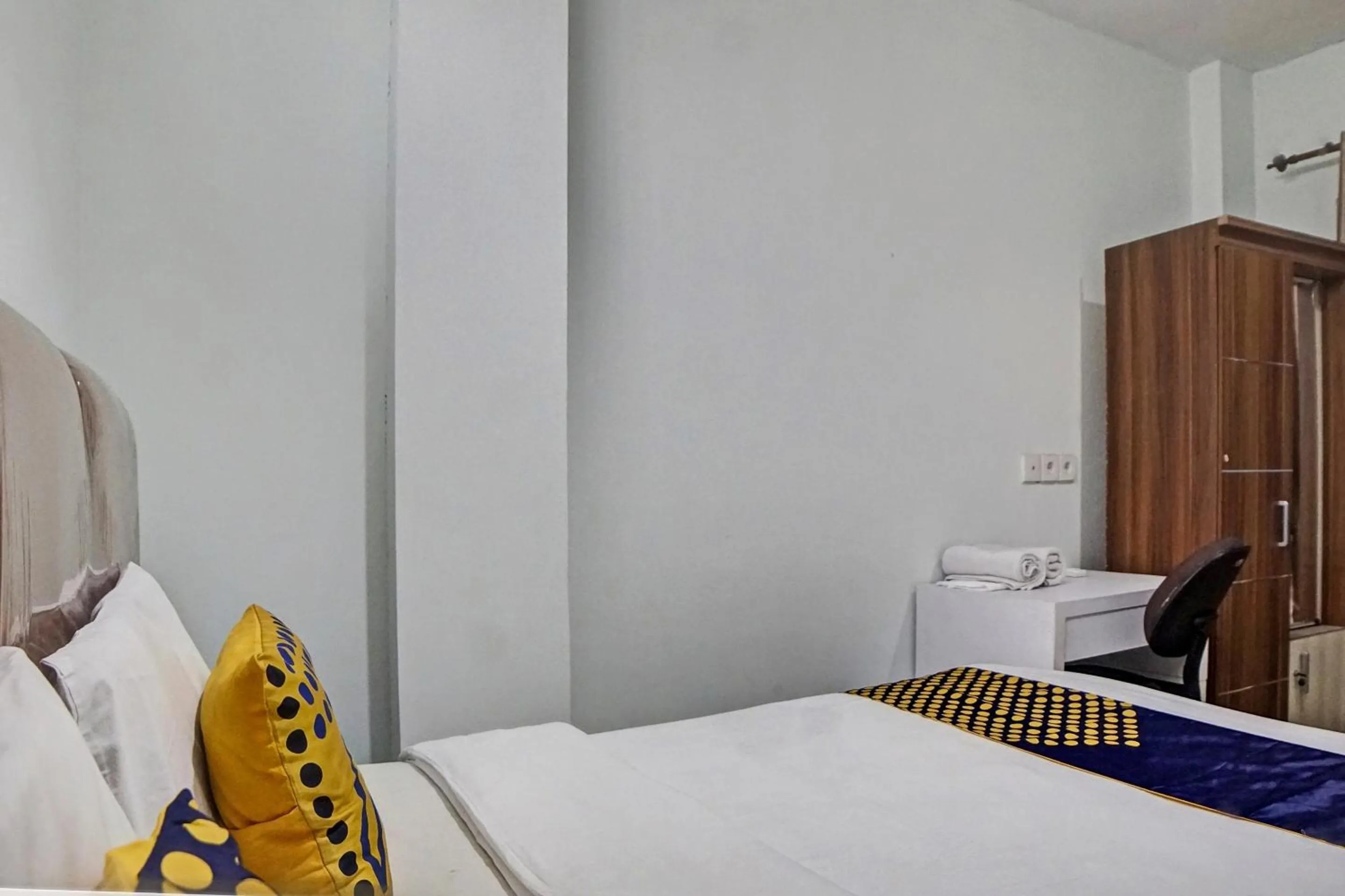 Bedroom in Hotel O Finest House Near Amplas Bus Terminal