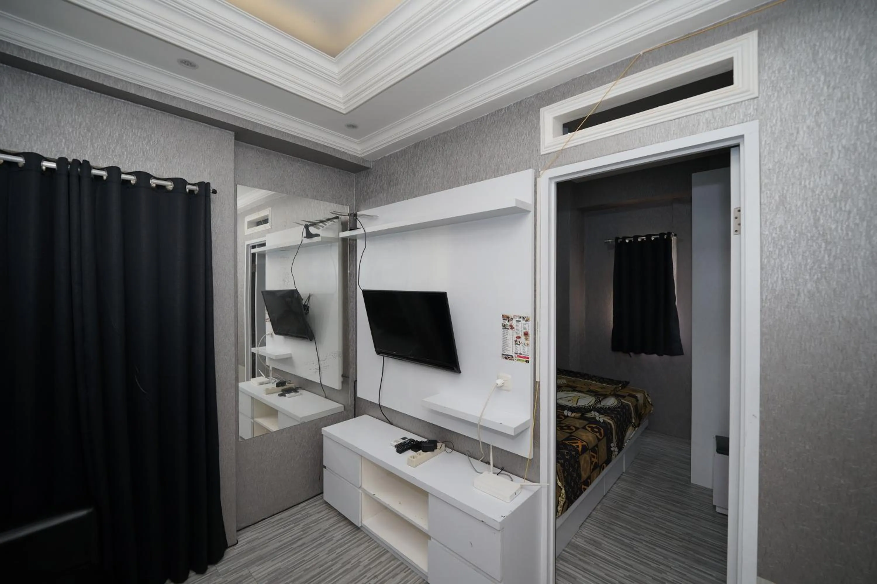 TV and multimedia in Perfect Stay Apartement The Suites Metro Bandung By Sultan Property
