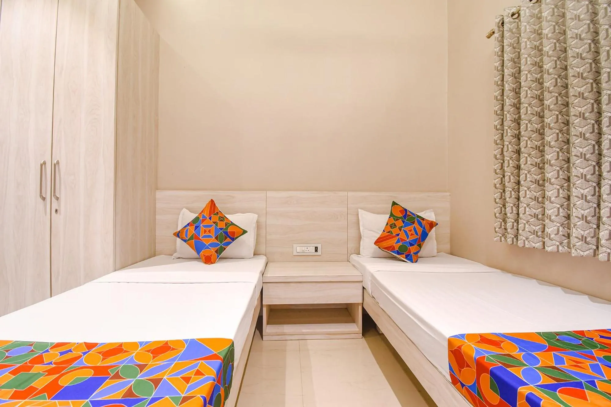 Bed in FabHotel Kitchen Q Inn - Belaghata