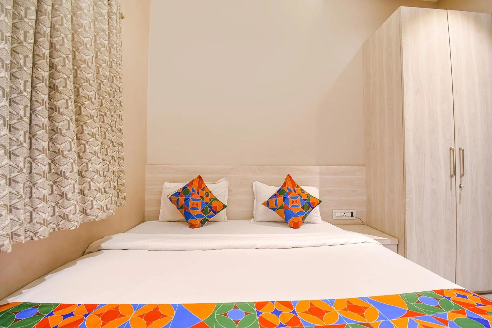 Bed in FabHotel Kitchen Q Inn - Belaghata