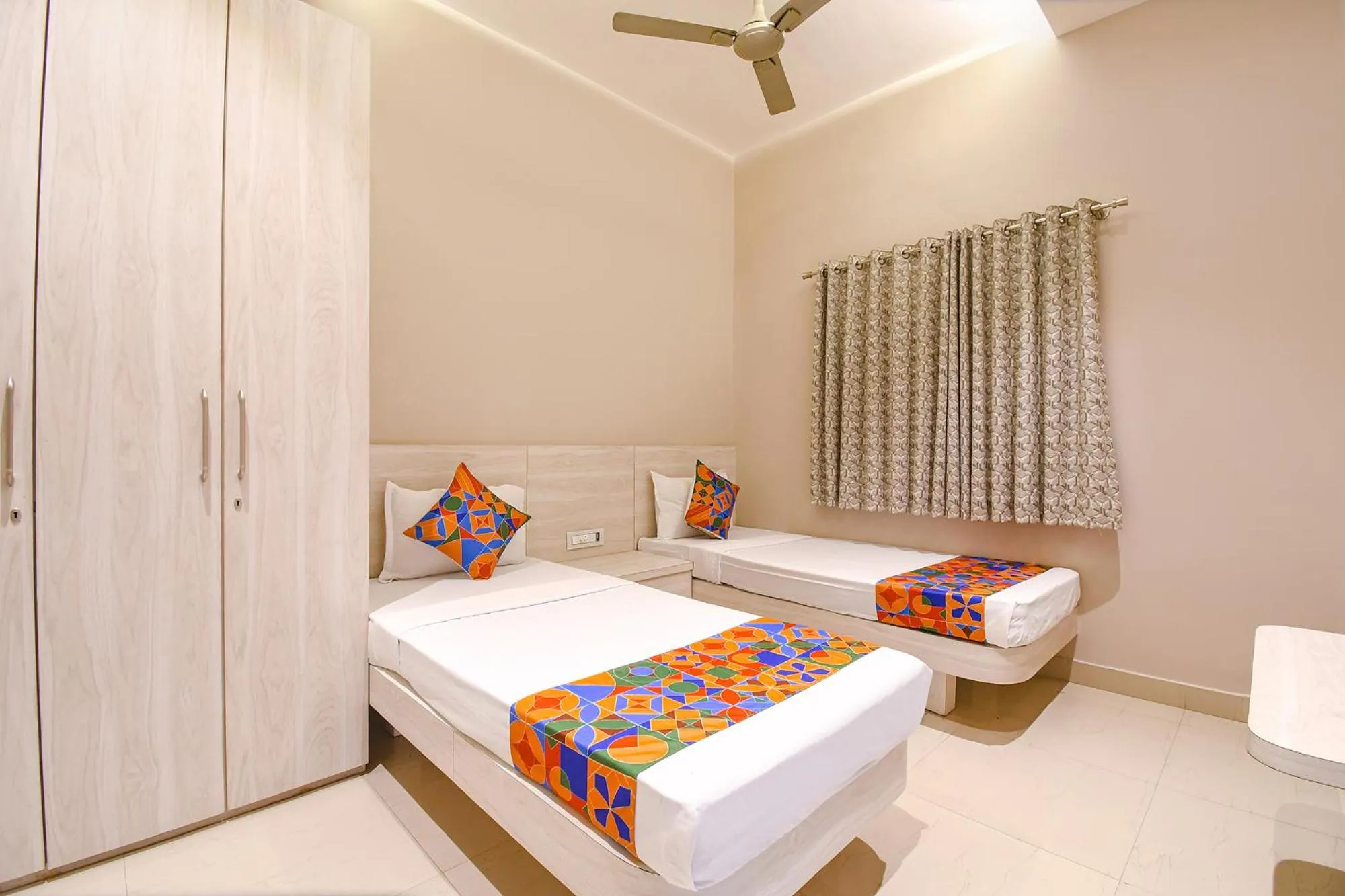 Bed in FabHotel Kitchen Q Inn - Belaghata