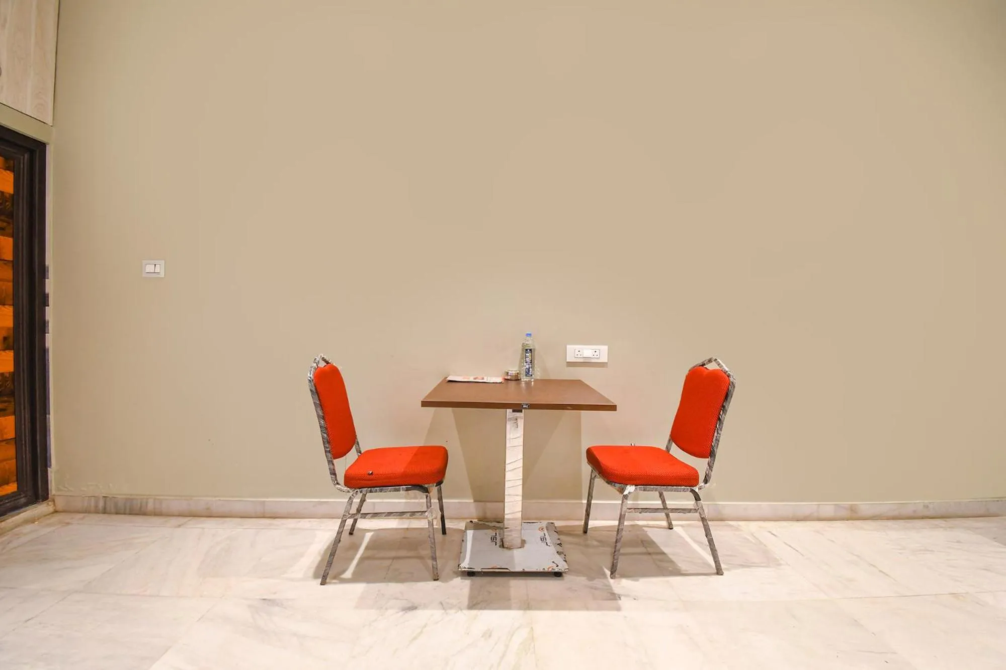 Seating area in FabHotel Kitchen Q Inn - Belaghata