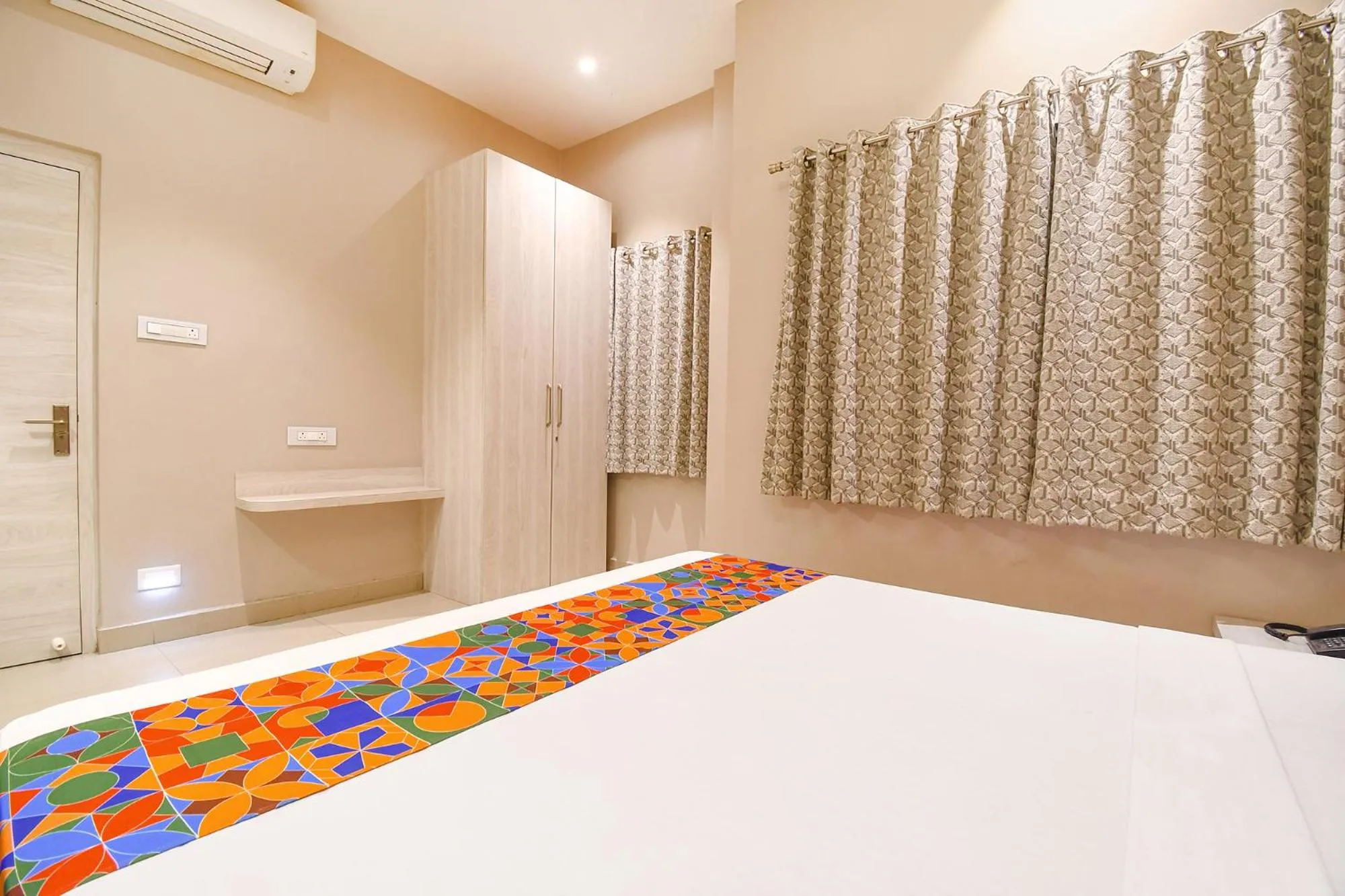 Bed in FabHotel Kitchen Q Inn - Belaghata