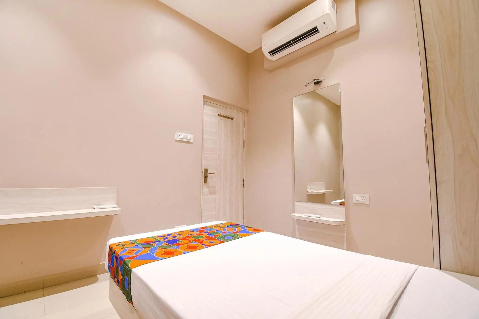 Bed in FabHotel Kitchen Q Inn - Belaghata