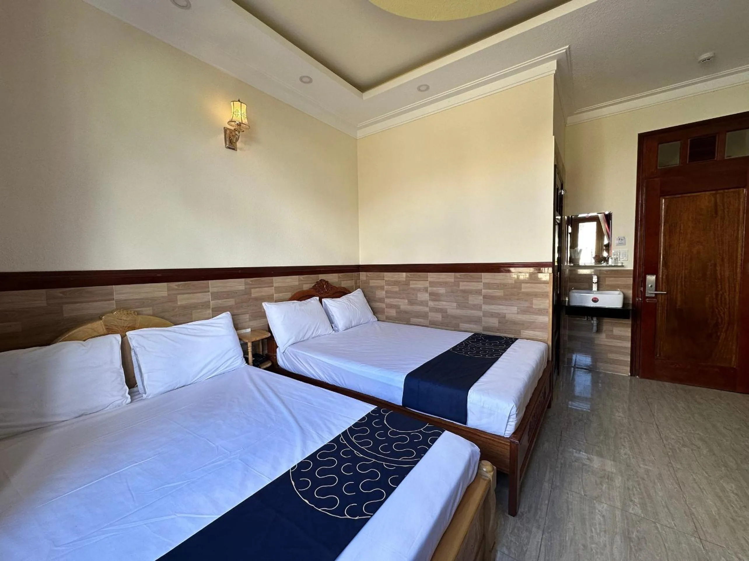 Bedroom, Bed in Capital O 1198 Dinh Loan Hotel