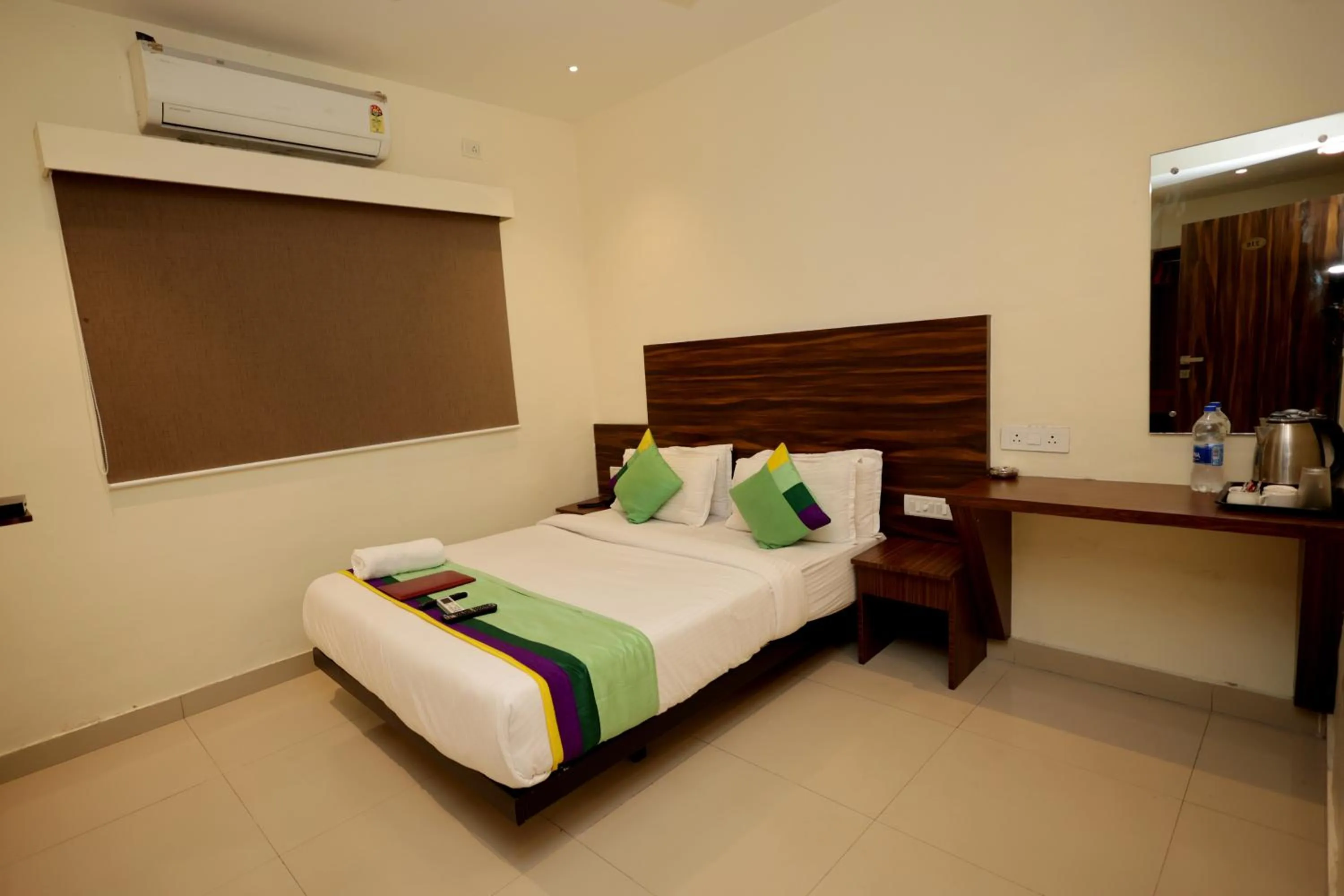 Bed in HOTEL GOLDEN TULIPZ