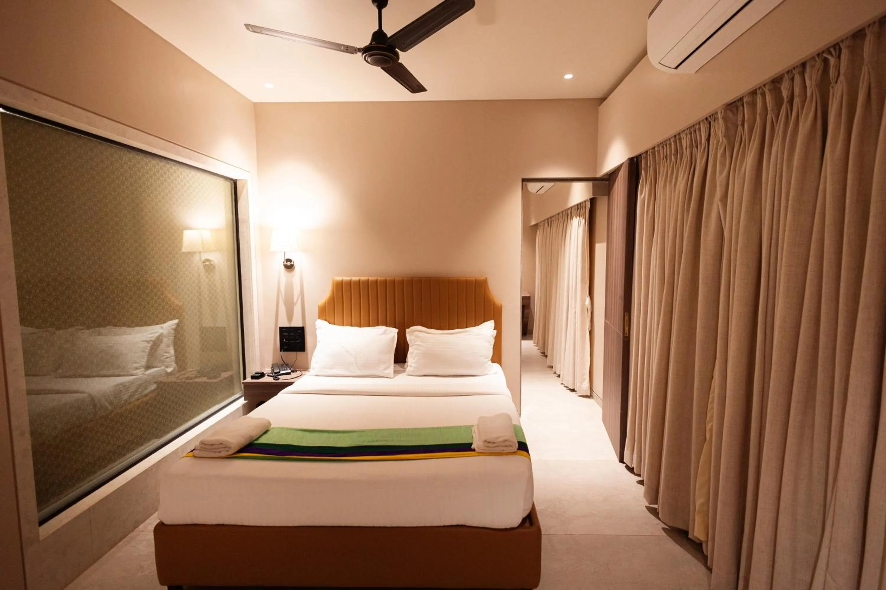 Bed in HOTEL GOLDEN TULIPZ