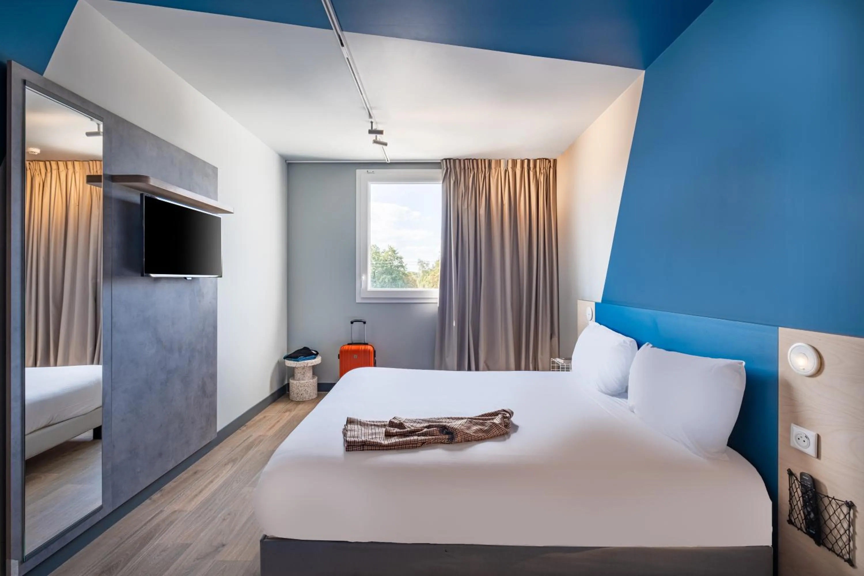 Bed in ibis budget Nantes Nord Treillières