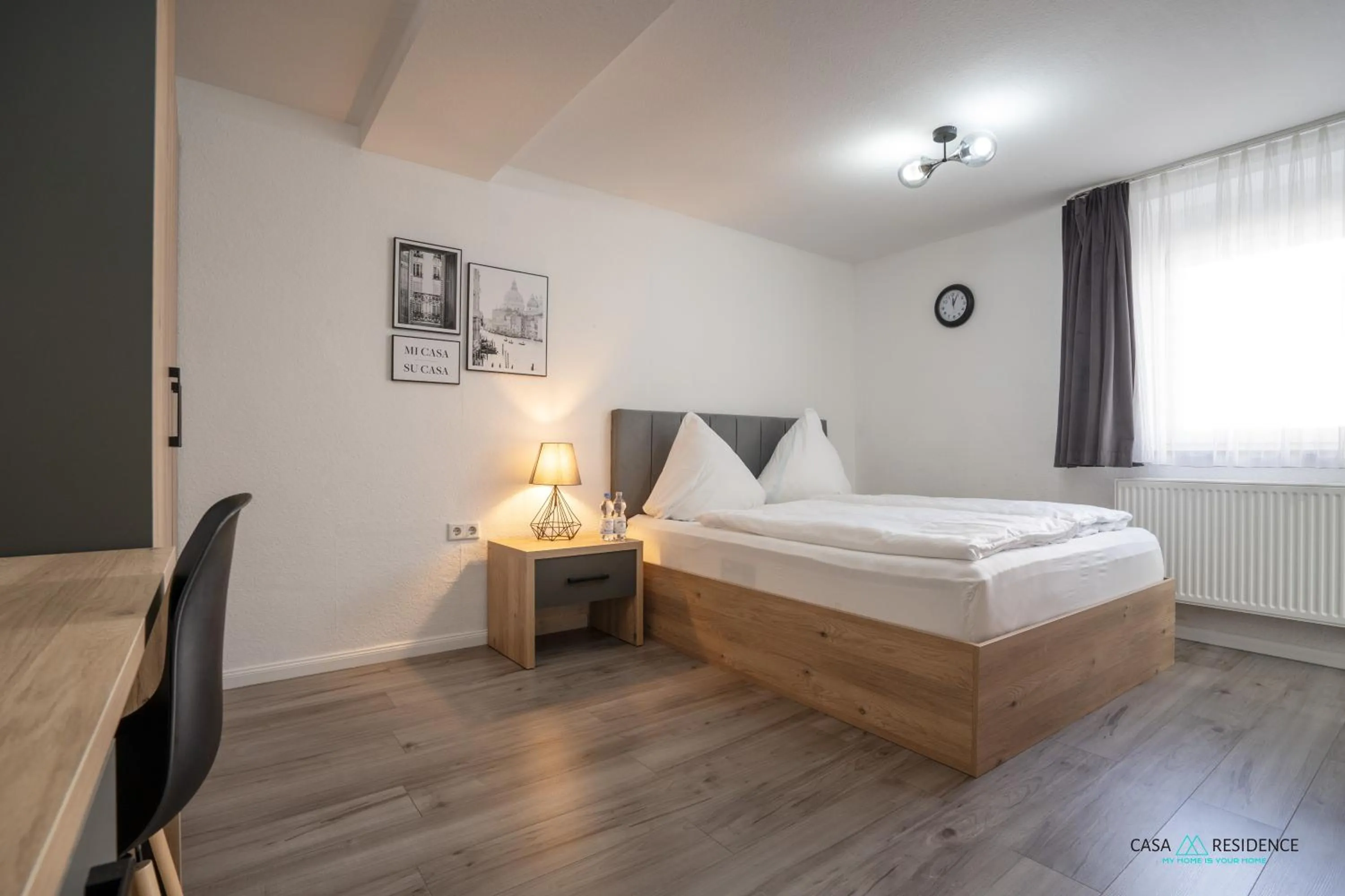 Bed in Louis Apartments