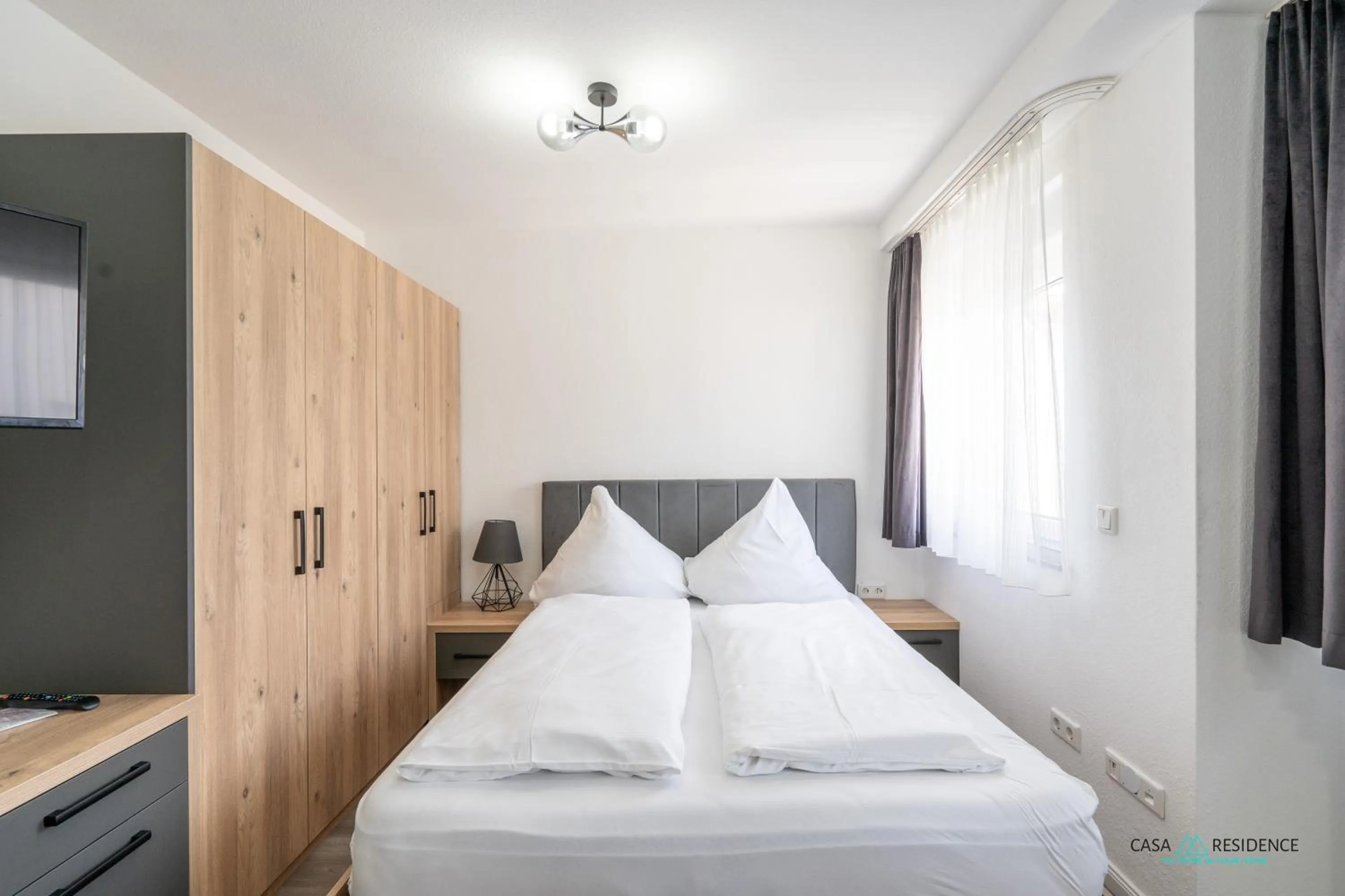 Bed in Louis Apartments