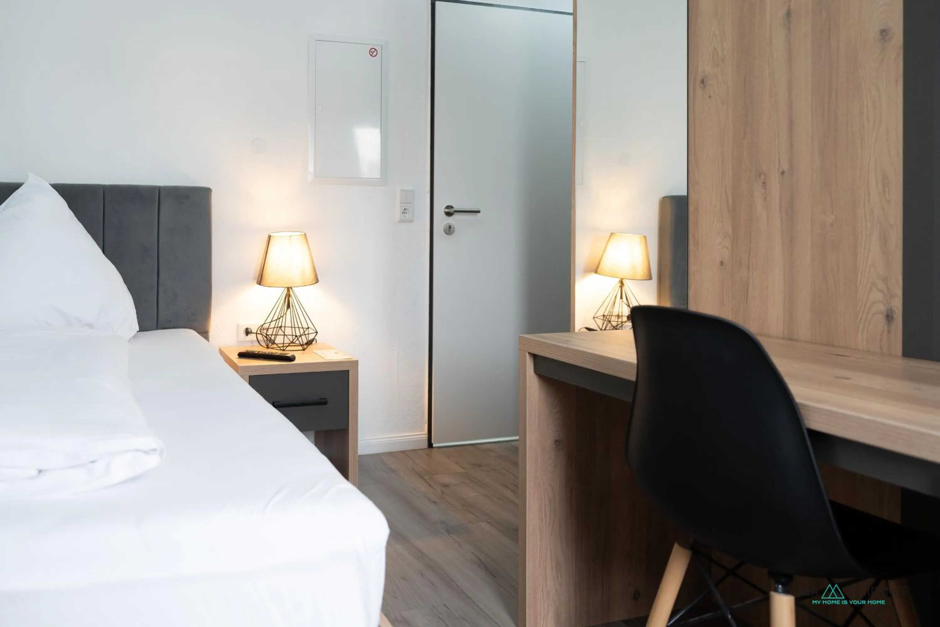 Bed in Louis Apartments