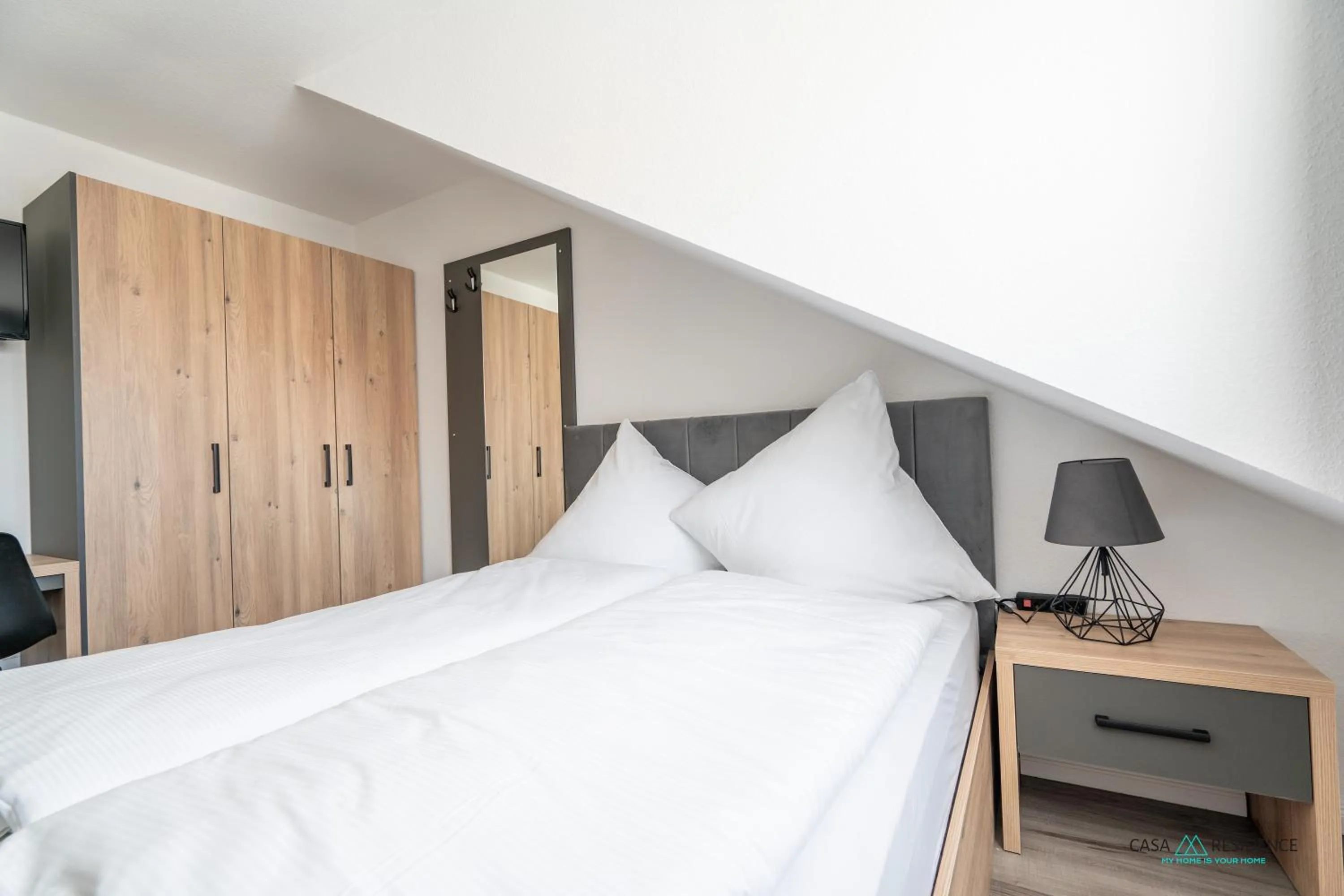 Bed in Louis Apartments