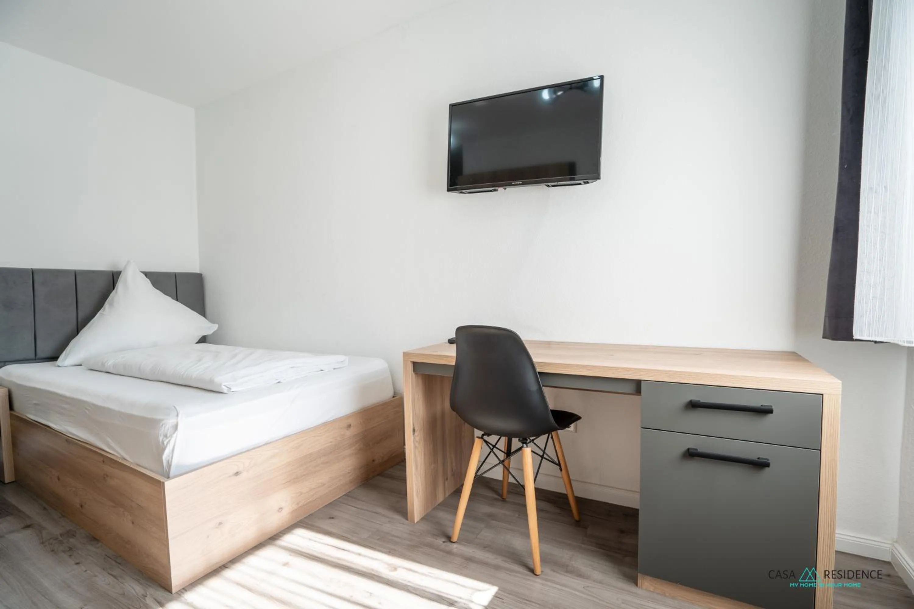 Bed in Louis Apartments