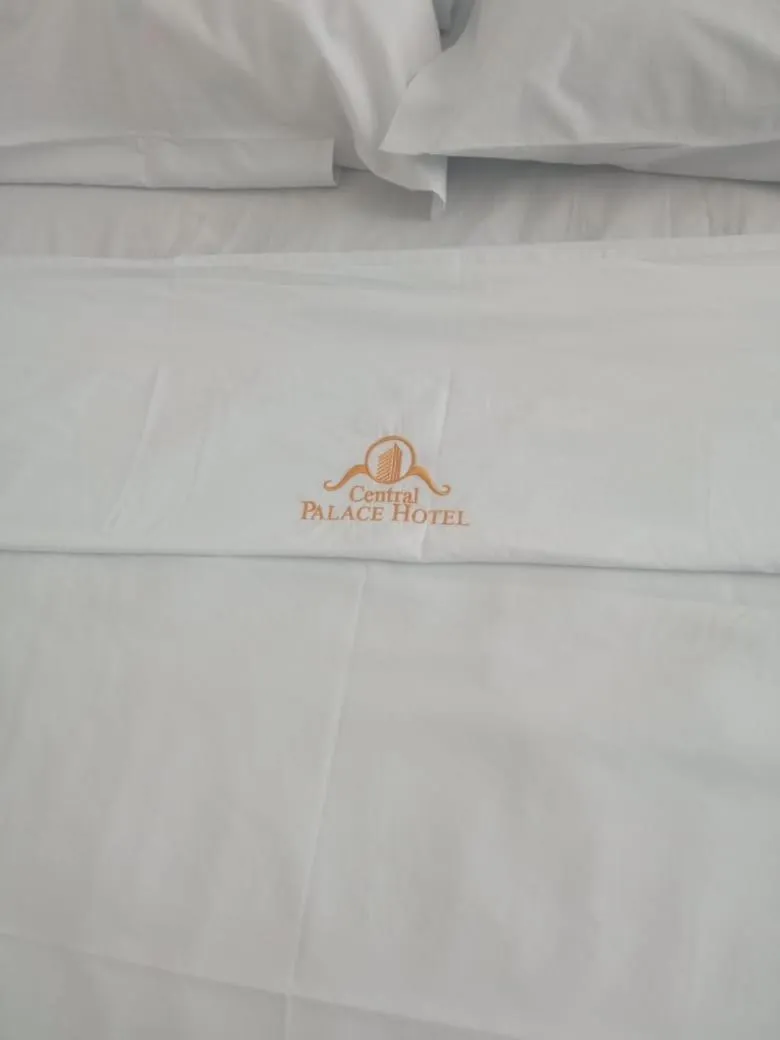 Bed in Central Palace Hotel