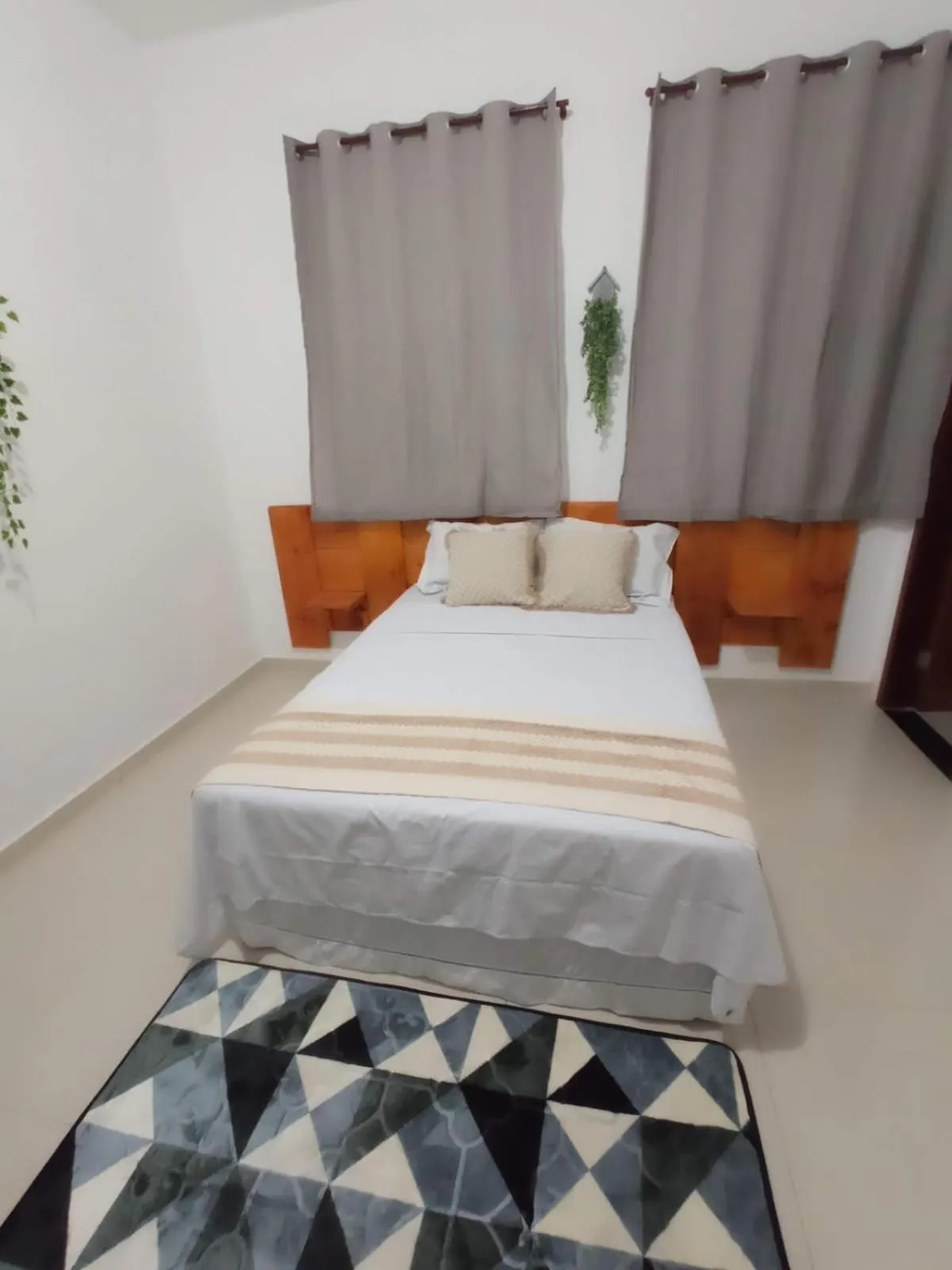 Bed in Central Palace Hotel