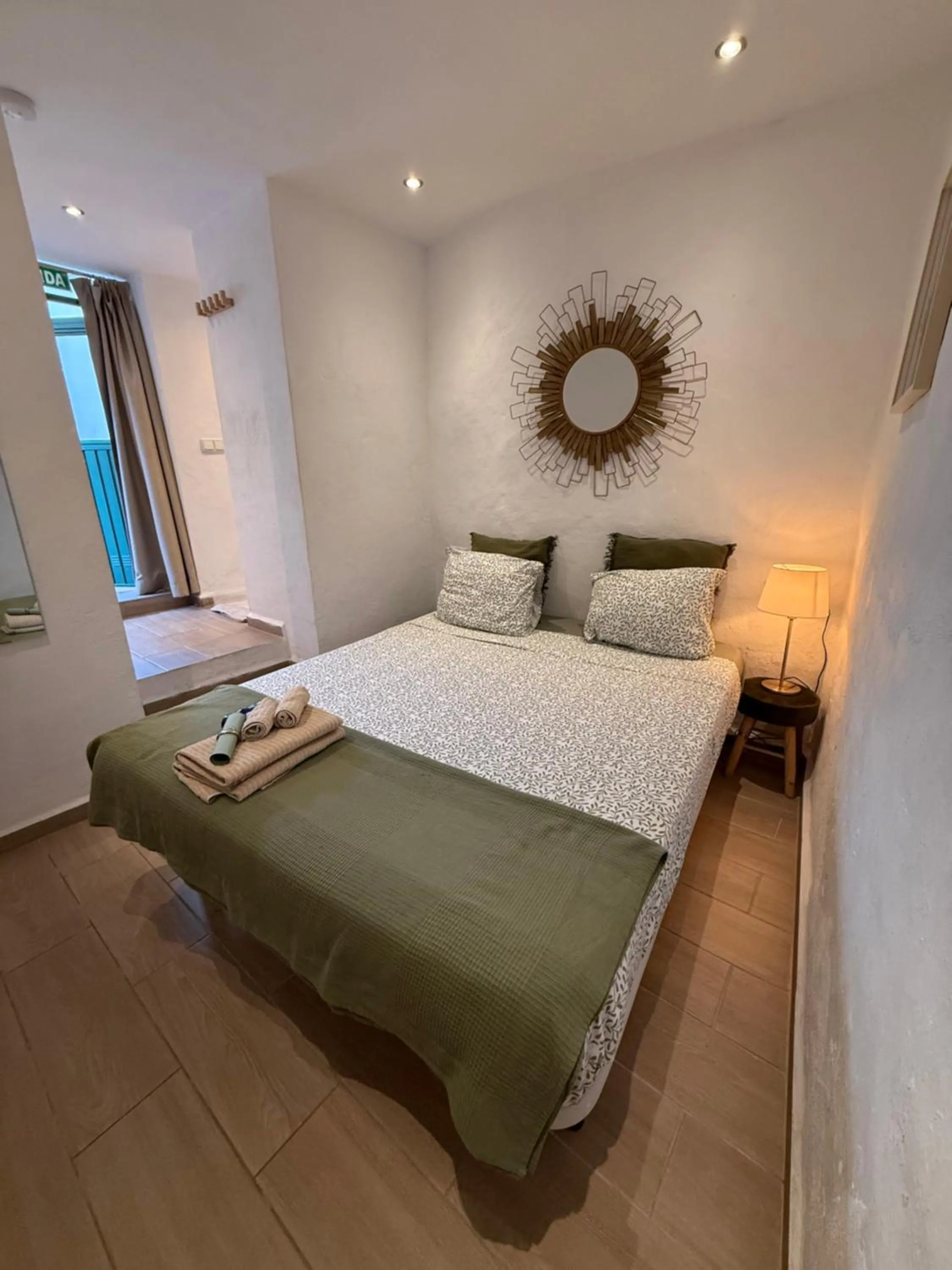 Bed in Encanto Guesthouse