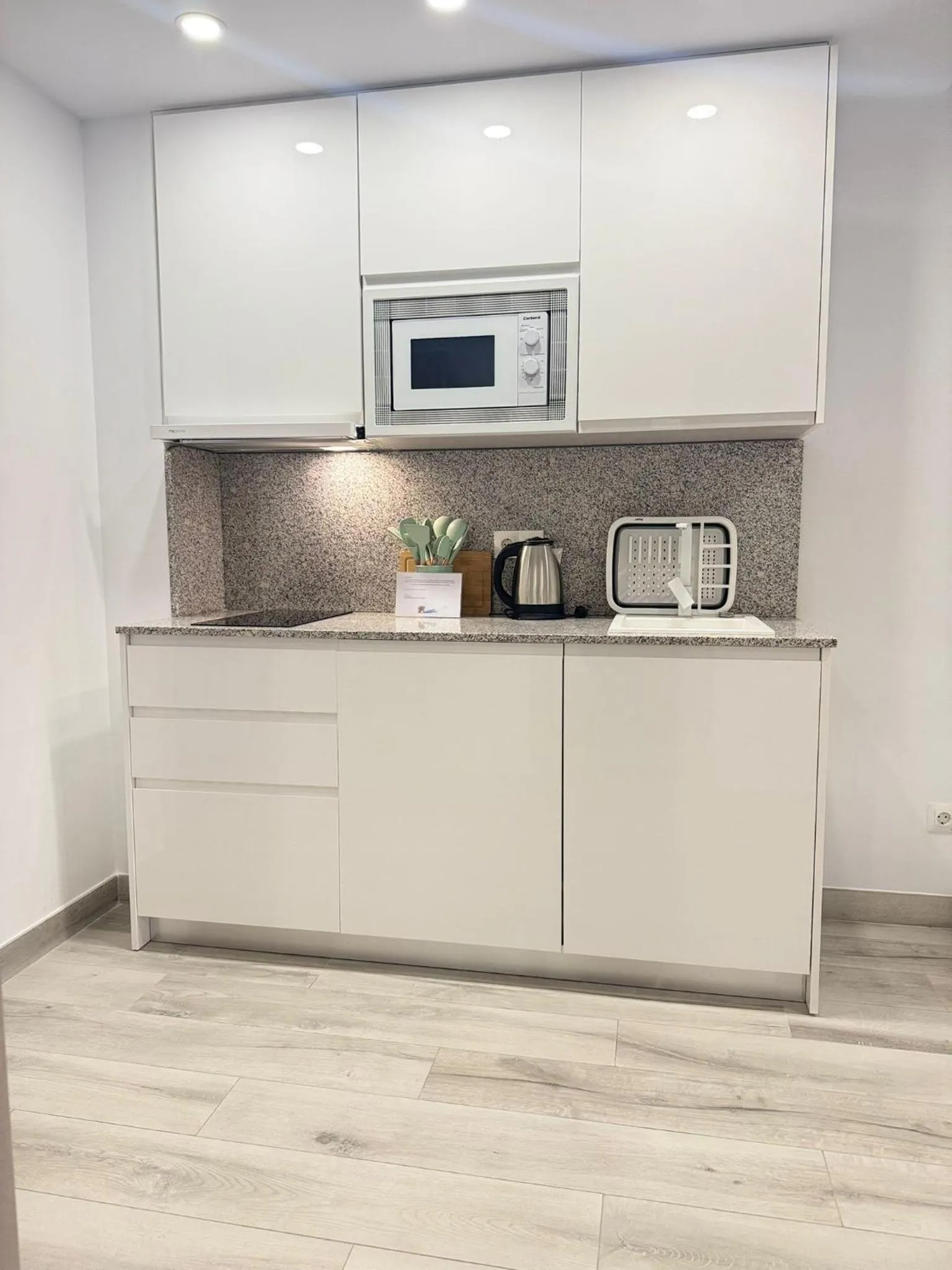 Kitchen or kitchenette in Hotel Apartamentos Antequera