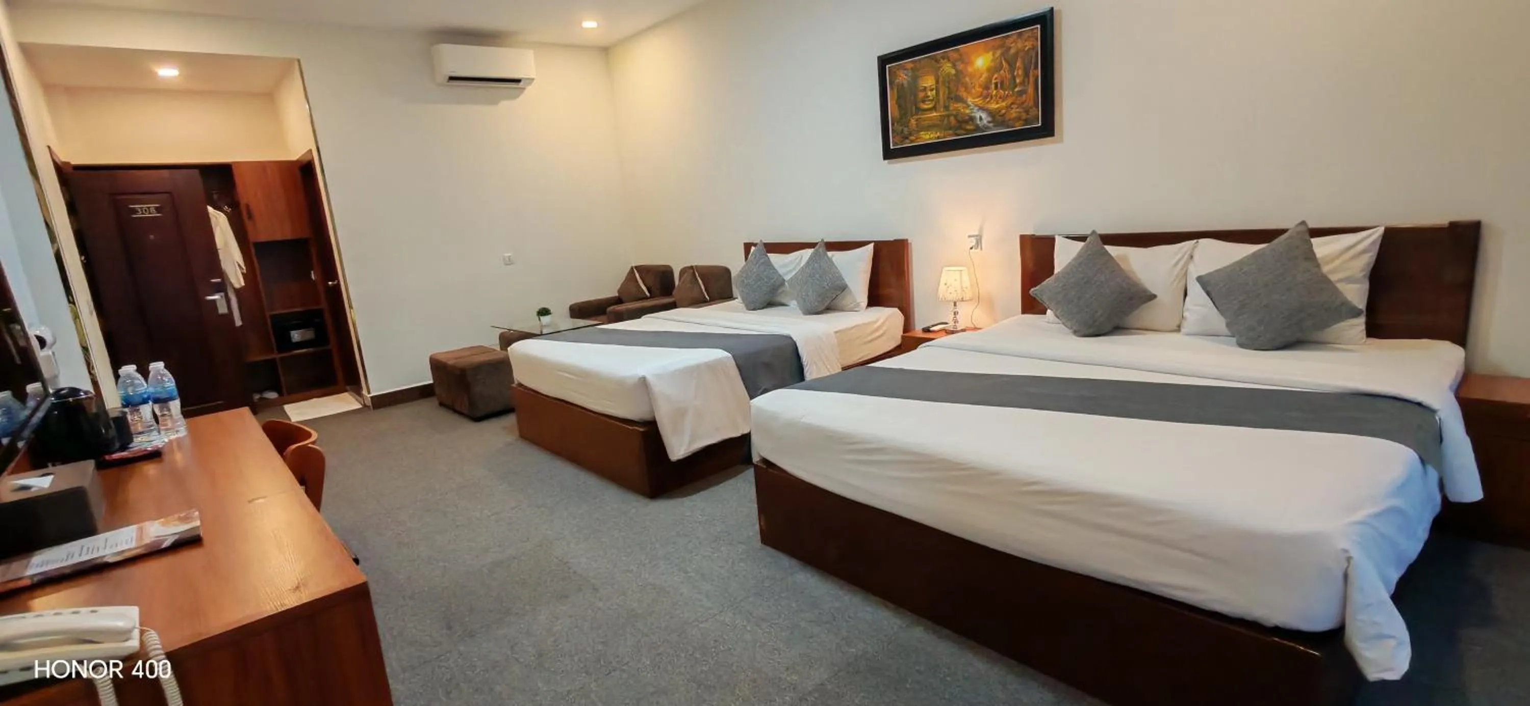 Photo of the whole room, Bed in Nimith Hotel & Restaurant