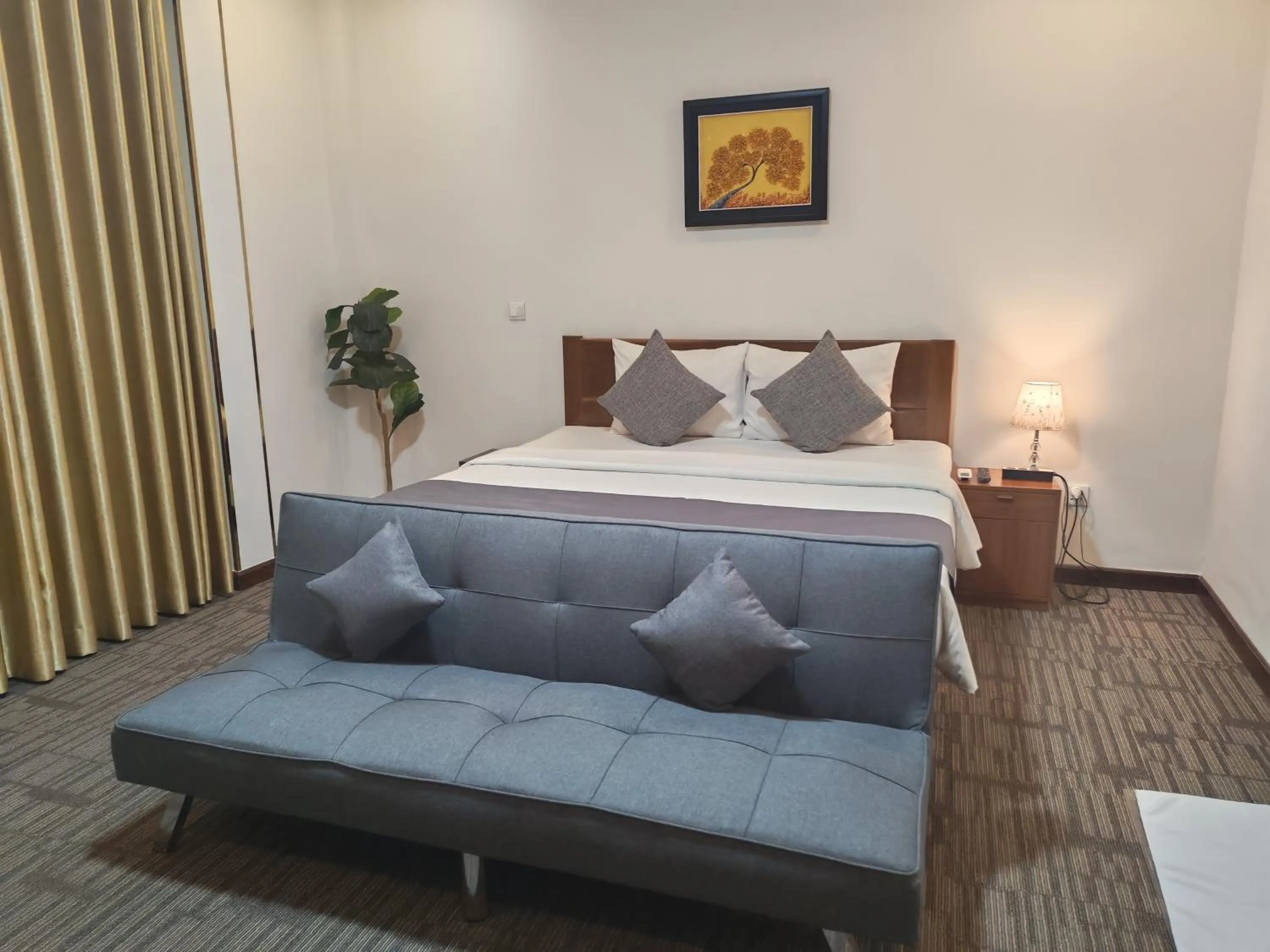 Photo of the whole room, Bed in Nimith Hotel & Restaurant