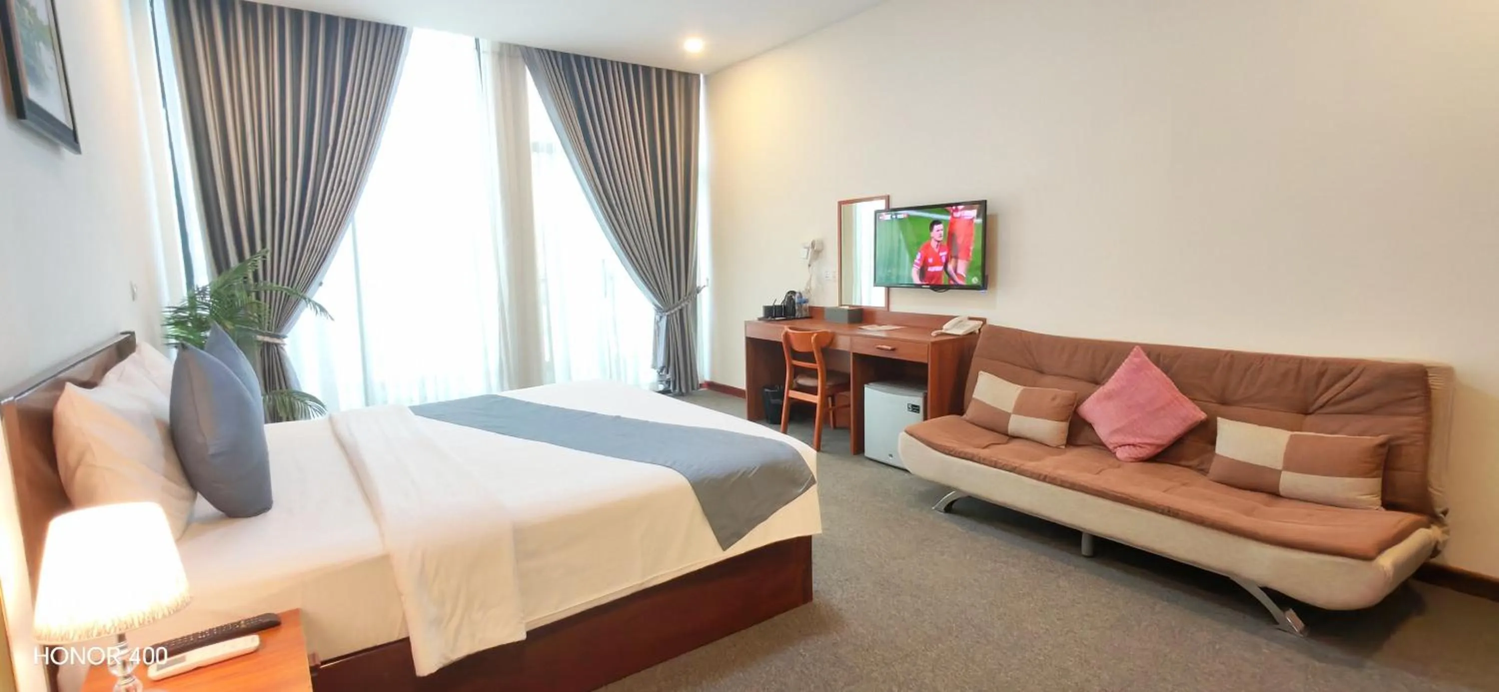 Photo of the whole room, Bed in Nimith Hotel & Restaurant