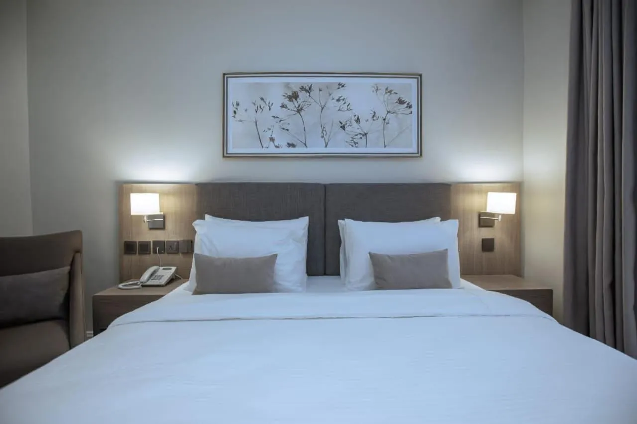 Bed in Knightsbridge Hotel & Suites