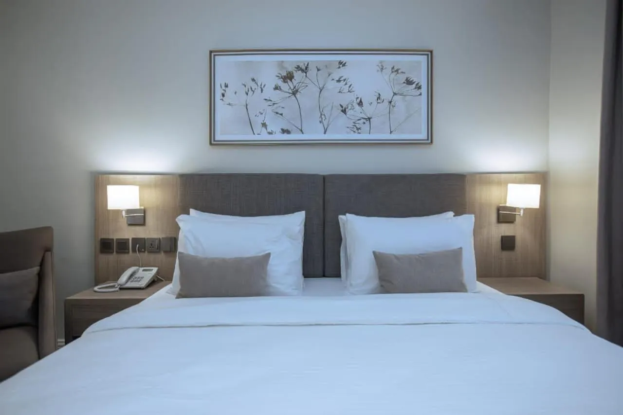 Bed in Knightsbridge Hotel & Suites